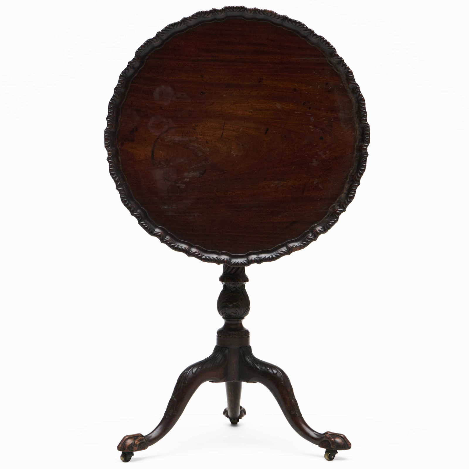 George III Mahogany Tripod Table: George III Mahogany Tripod TableRaised on casters.28 1/2 x 25 in. diam. 