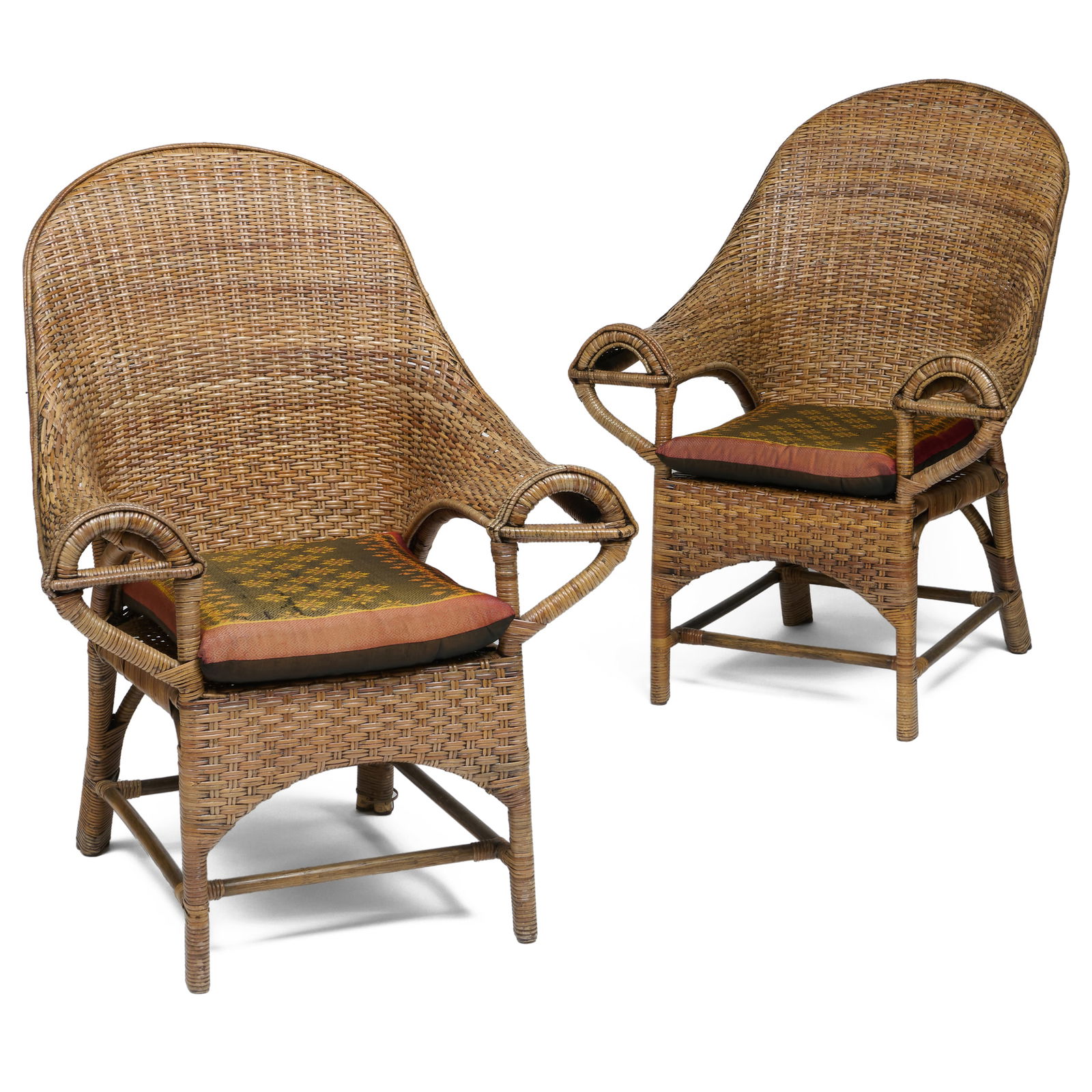 Pair of Large Wicker Armchairs: Pair of Large Wicker Armchairs 42 x 34 x 29 in., seat height 17 in. without seat cushion.