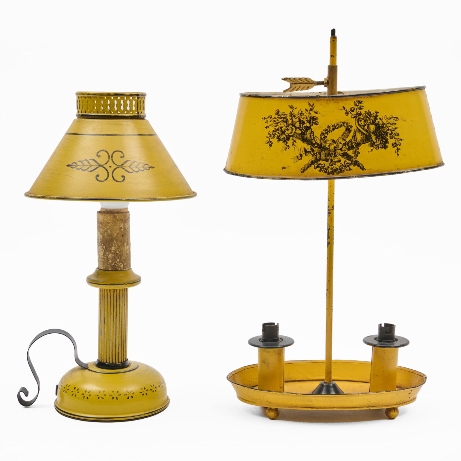Yellow Tole Peinte Bouillotte Lamp and a Shaded Candlestick: Yellow Tole Peinte Bouillotte Lamp and a Shaded Candlestick Label.The bouillotte lamp 16 x 9 x 5 1/4 in., the candlestick lamp 13 1/2 x 6 1/2 x 7 in. The Collection of Alan and Marilyn Bergman.