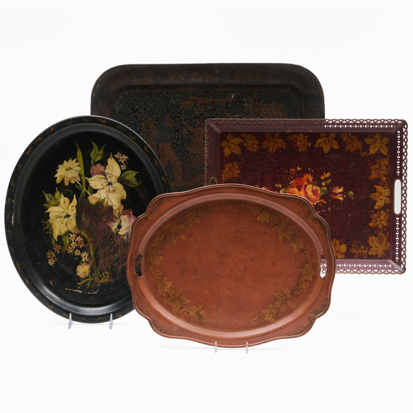 Group of Four Tole Trays: Group of Four Tole Trays The largest 22 1/4 x 16 1/4 in., the smallest 13 3/4 x 17 1/4 in. The Collection of Alan and Marilyn Bergman.