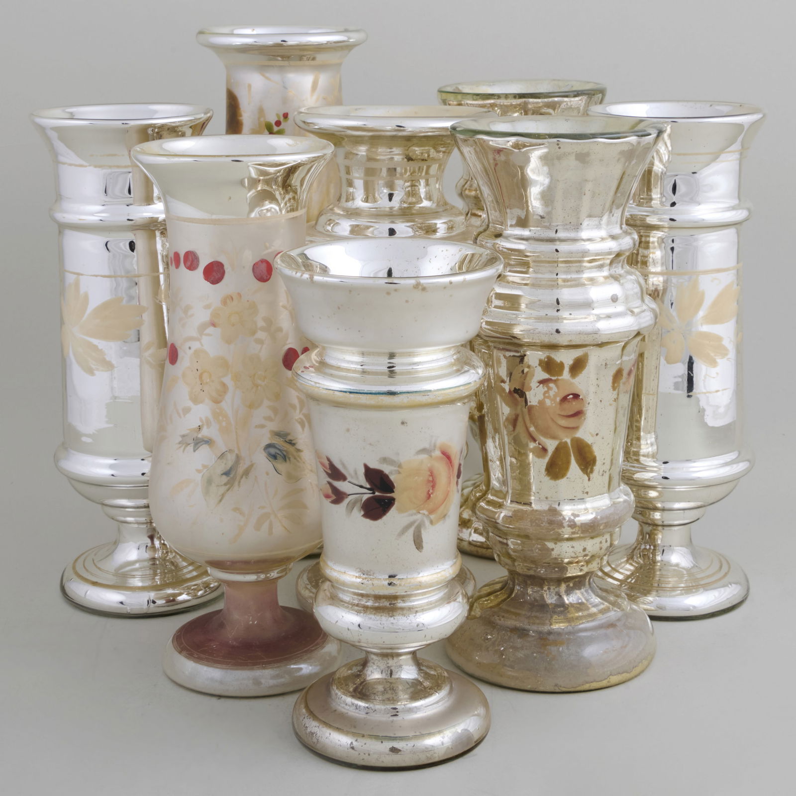 Group of Eight Mercury Glass Vases: Group of Eight Mercury Glass Vases Comprising: A pair of vases decorated with white flowers A pair of fluted vases decorated with white and pink flowers A group of four vases in various sizes and styl