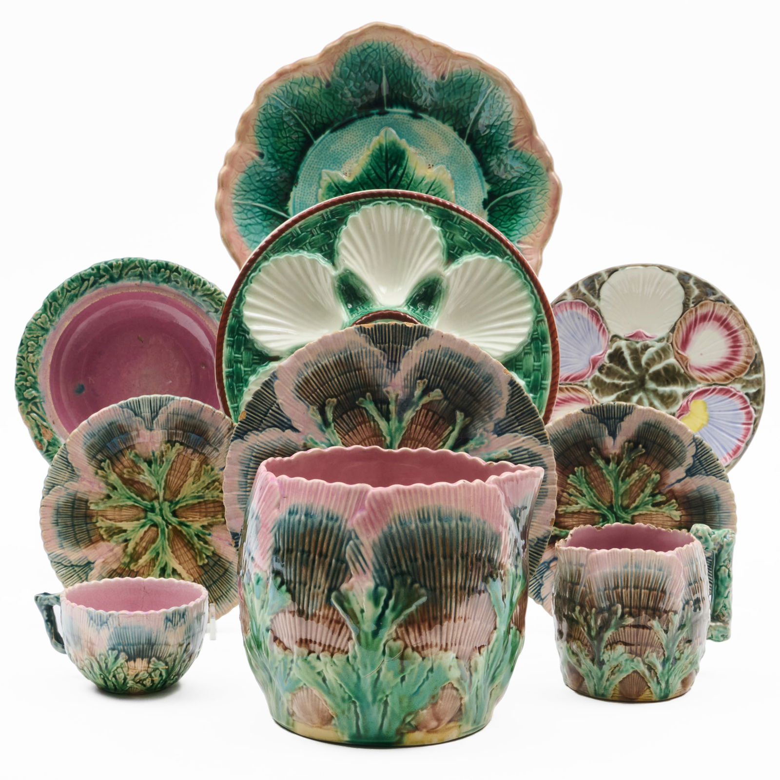 Group of Etruscan Majolica Shell and Seaweed Wares: Group of Etruscan Majolica Shell and Seaweed Wares Impressed marks.Comprising:A large pitcherA small pitcherA circular serving dish, lacking coverA teacup and two saucersA s