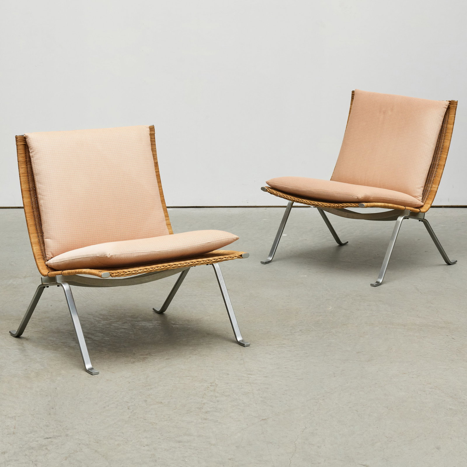 Pair of Poul Kjearholm Rattan and Chrome-Plated Steel PK22 Lounge Chairs Produced by E. Kold (1 of 8)