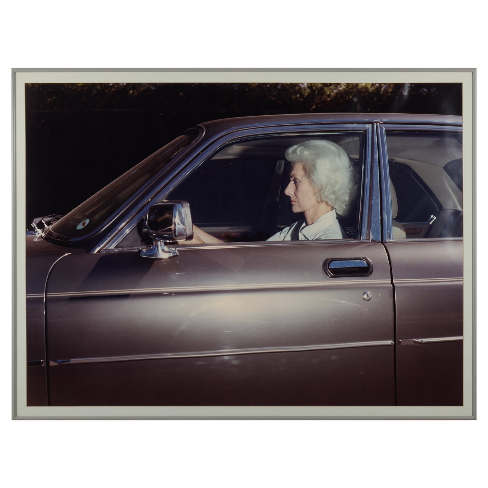 Andrew Bush (b. 1956): Woman Caught in Traffic While Heading Southwest on Highway #101: Andrew Bush (b. 1956): Woman Caught in Traffic While Heading Southwest on Highway #101 Chromogenic print, 1989, printed in 1992, signed, titled, dated and numbered 4/5. 30 x 40 in. (sheet), 31 x 41 in