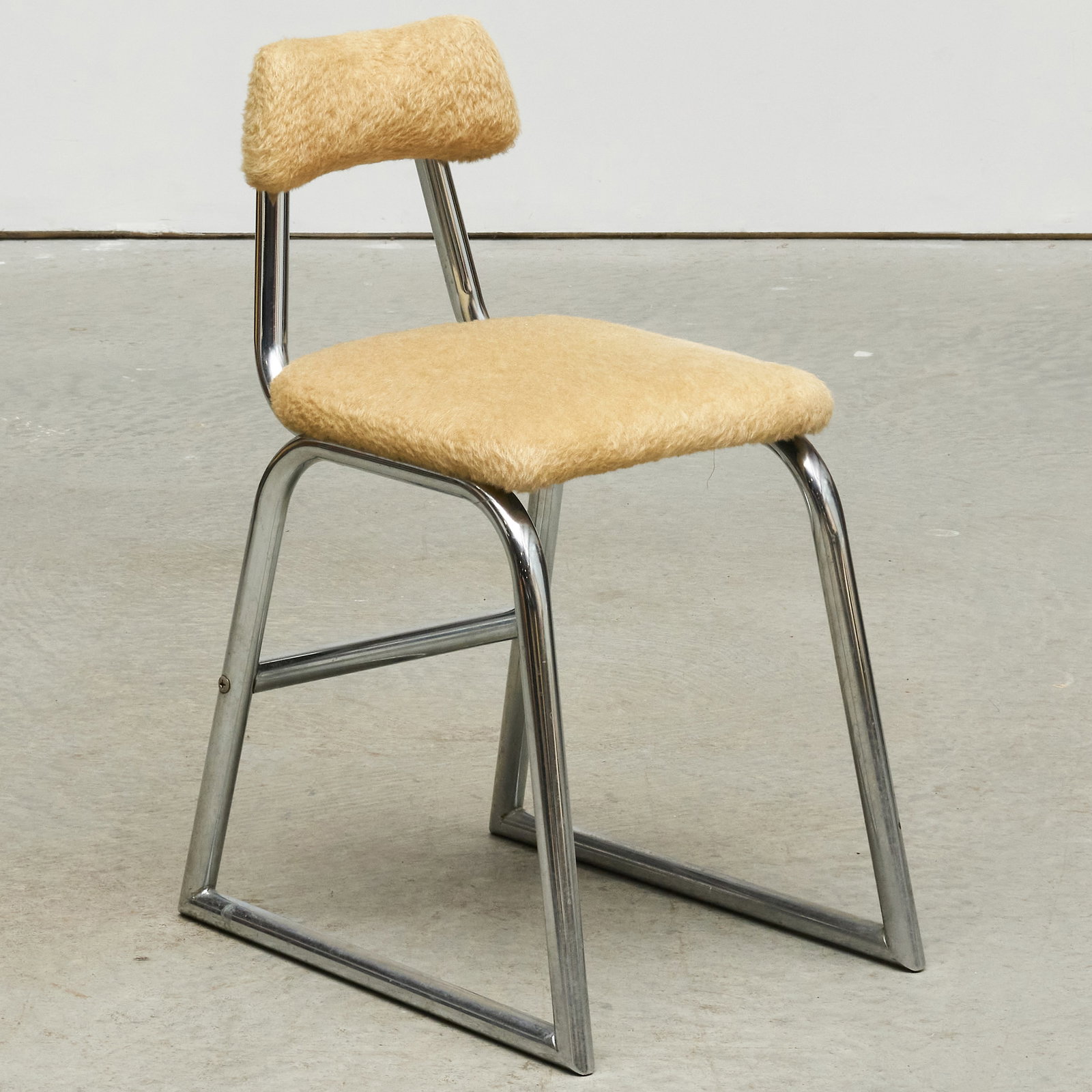 Chrome Teddy Bear Fabric Upholstered Vanity Chair: Chrome Teddy Bear Fabric Upholstered Vanity Chair 26 x 13 x 18 in., seat height 17 in. Collection of Barbara Jakobson.