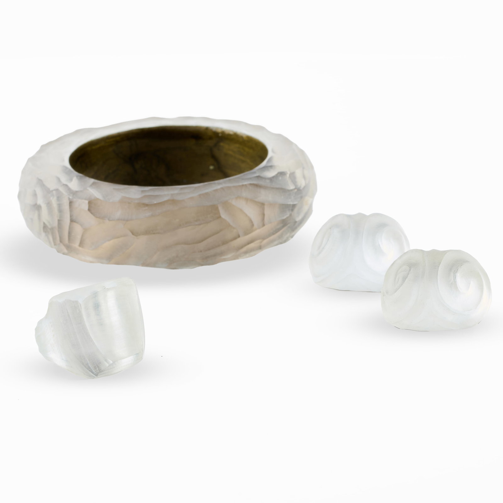 Group of Alexis Bittar Carved Lucite Jewelry: Group of Alexis Bittar Carved Lucite Jewelry With label.Comprising:A pair of clip earringsA ringA braceletThe bracelet 2 1/2 in. diam. (interior), 3 3/4 in. diam. (exterior). Collection of Barbara