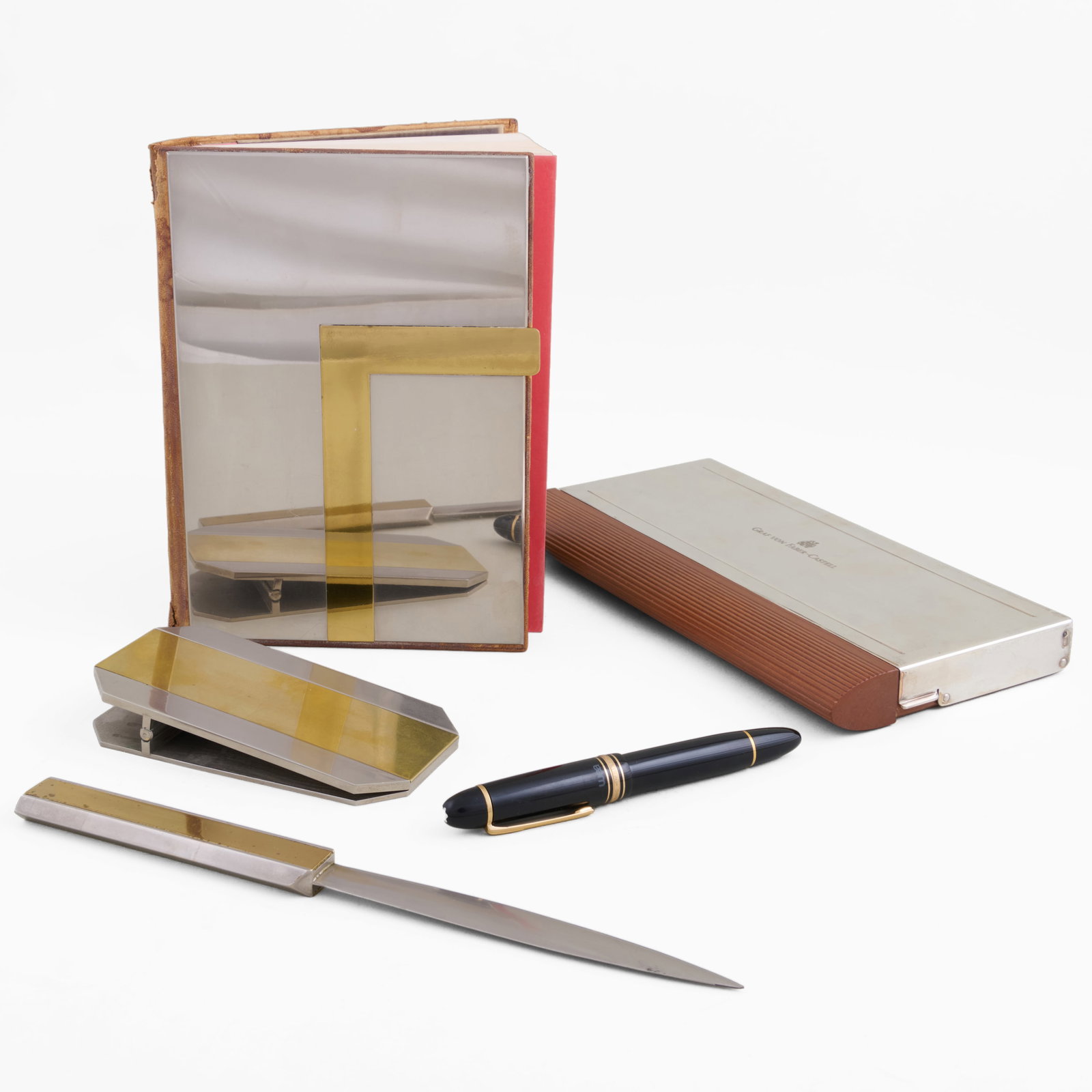 Graf von Faber-Castell Four-Piece Desk Set with a Mont Blanc Fountain Pen: Graf von Faber-Castell Four-Piece Desk Set with a Mont Blanc Fountain Pen With certificate no. AA241.Comprising:A notebookA pencil setA letter clipA letter openerTogether wi