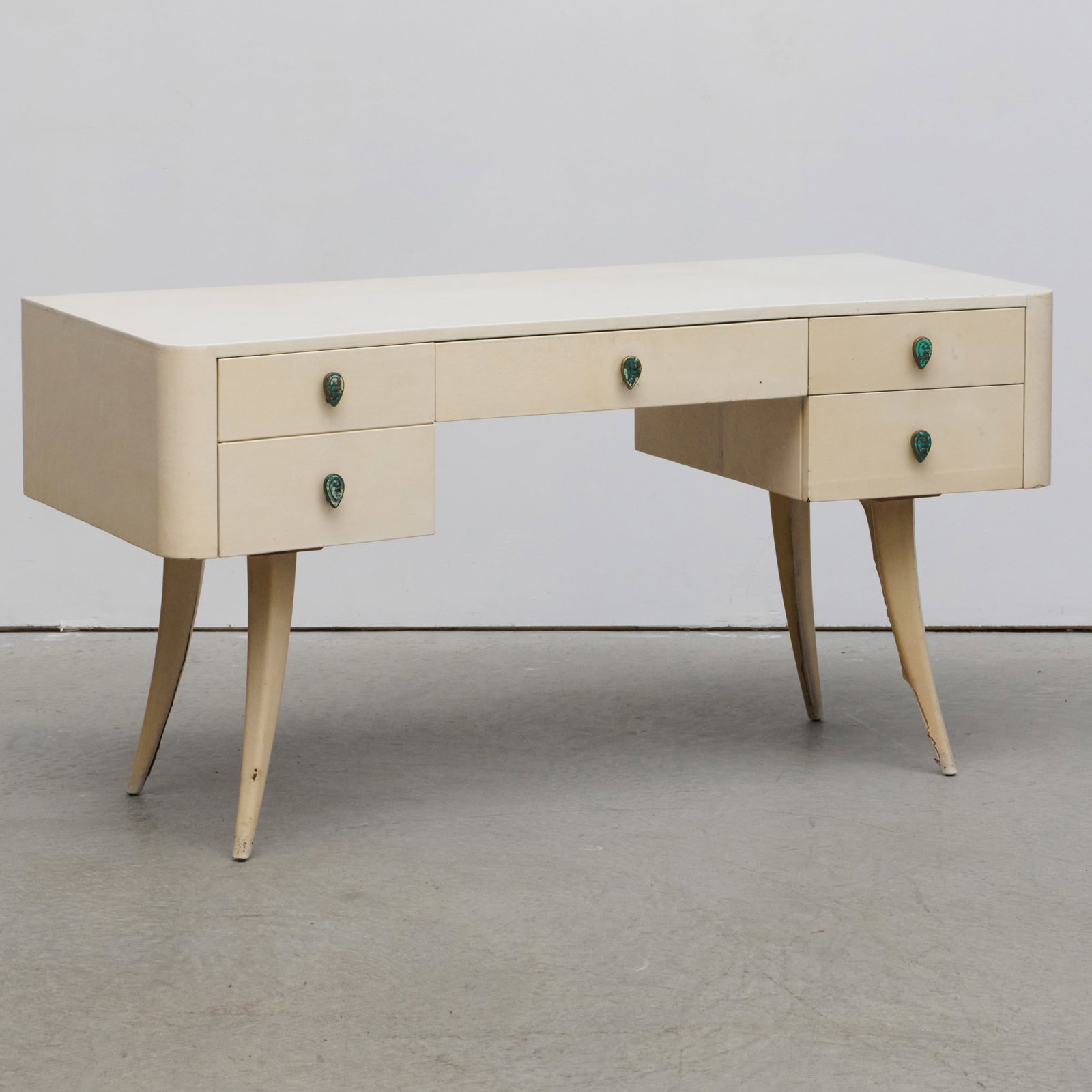 Vellum Covered Desk with Pepe Mendoza Brass and Enamel Pulls: Vellum Covered Desk with Pepe Mendoza Brass and Enamel Pulls Fitted with inlaid handles and five drawers. 29 3/4 x 4 ft. 10 x 25 in.