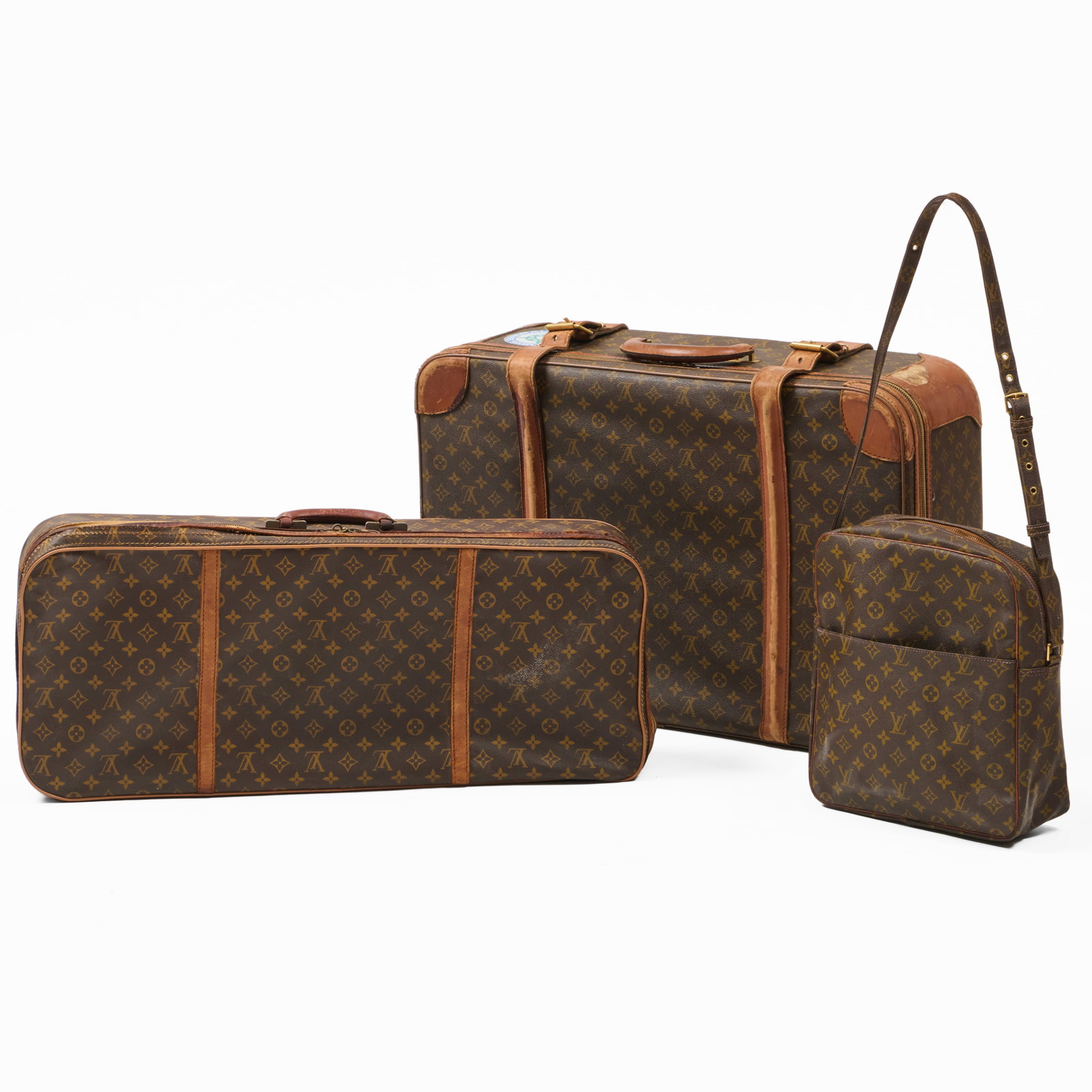 Two Louis Vuitton Leather Soft-Sided Suitcases and a Reproduction Handbag (1 of 20)