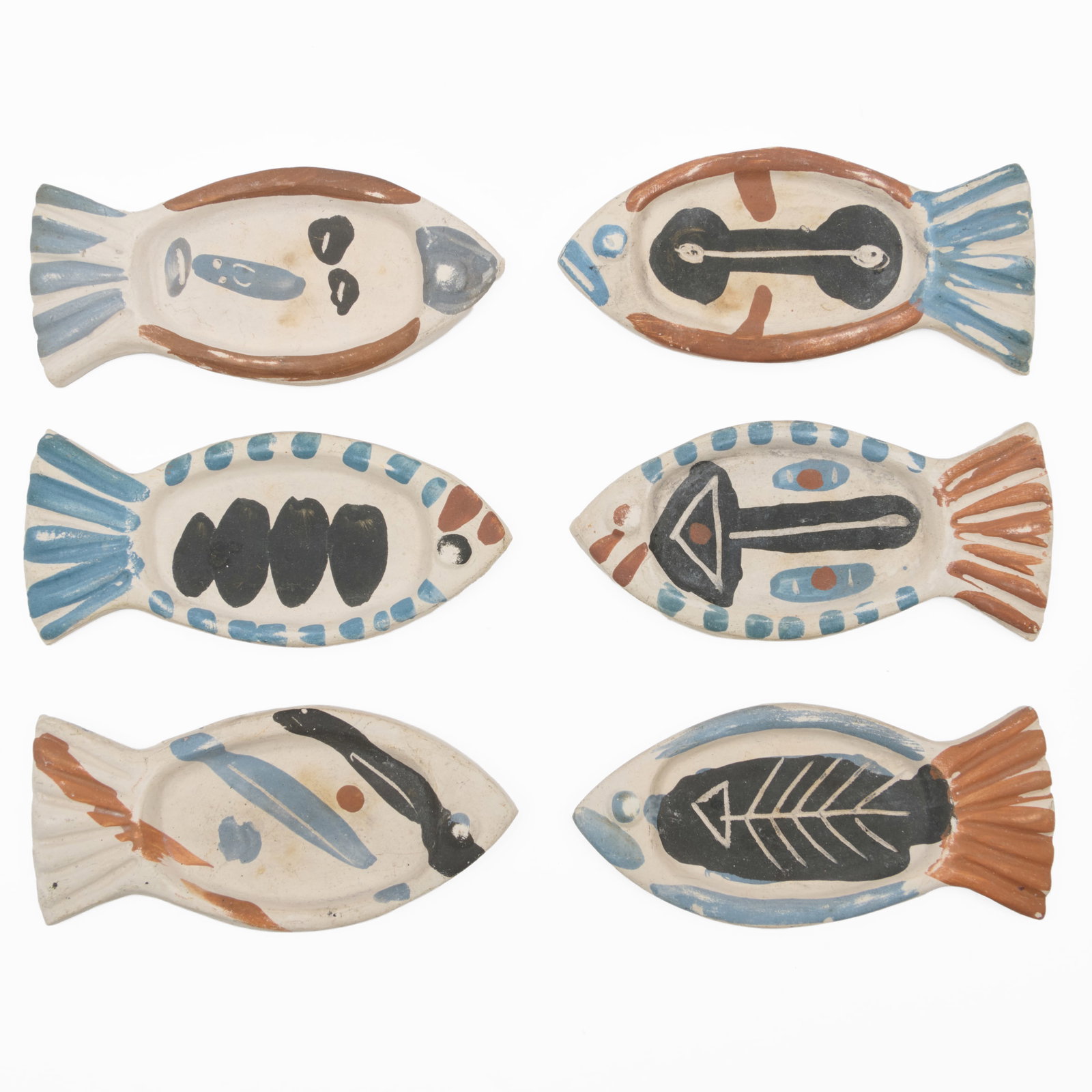 After Picasso, Set of Six Fish Shaped Ceramic Dishes: After Picasso, Set of Six Fish Shaped Ceramic Dishes With spurious inscription.2 1/4 x 4 3/4 in. The Vincent Dyckman Andrus Family Collection.