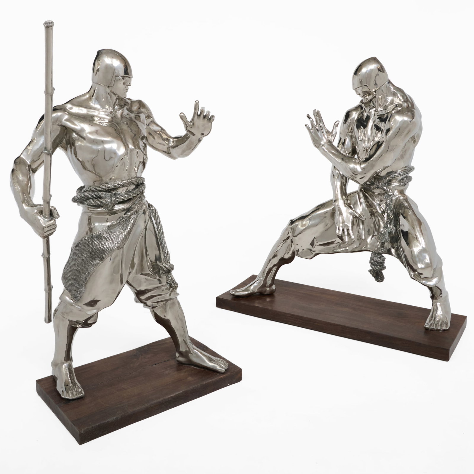 Ren Zhe (b. 1983): People Sculpture of China: Ren Zhe (b. 1983): People Sculpture of China Two chrome on wood base, both signed and numbered 6/8 on the back. 38 x 31 x 11 1/2 in., 38 x 23 x 21 in.