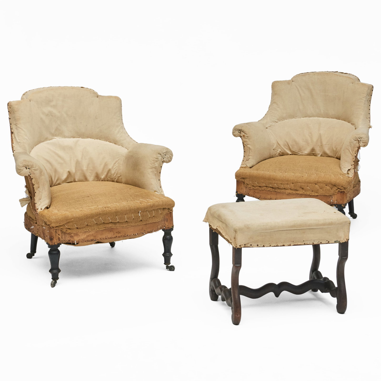 Pair of Napoleon III Ebonized Bergeres, Lacking Upholstery: Pair of Napoleon III Ebonized Bergeres, Lacking Upholstery Together with a Louis XV provincial oak stool, lacking upholstery. The bergeres raised on casters.32 1/2 x 31 x 30 in., seat height 13 in.,