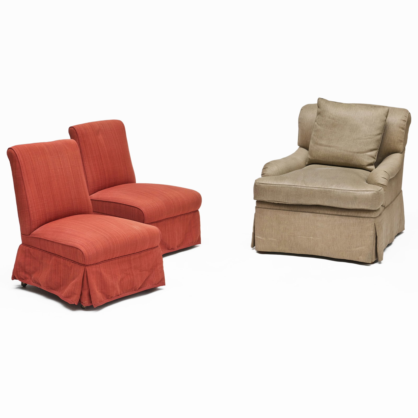 Pair of Upholstered Slipper Chairs together with a Grey Upholstered Armchair: Pair of Upholstered Slipper Chairs together with a Grey Upholstered Armchair 27 x 21 x 25 in., seat height 13 in., the slipper chairs, raised on casters. 28 x 29 x 40 in., seat height 16 in., the armc