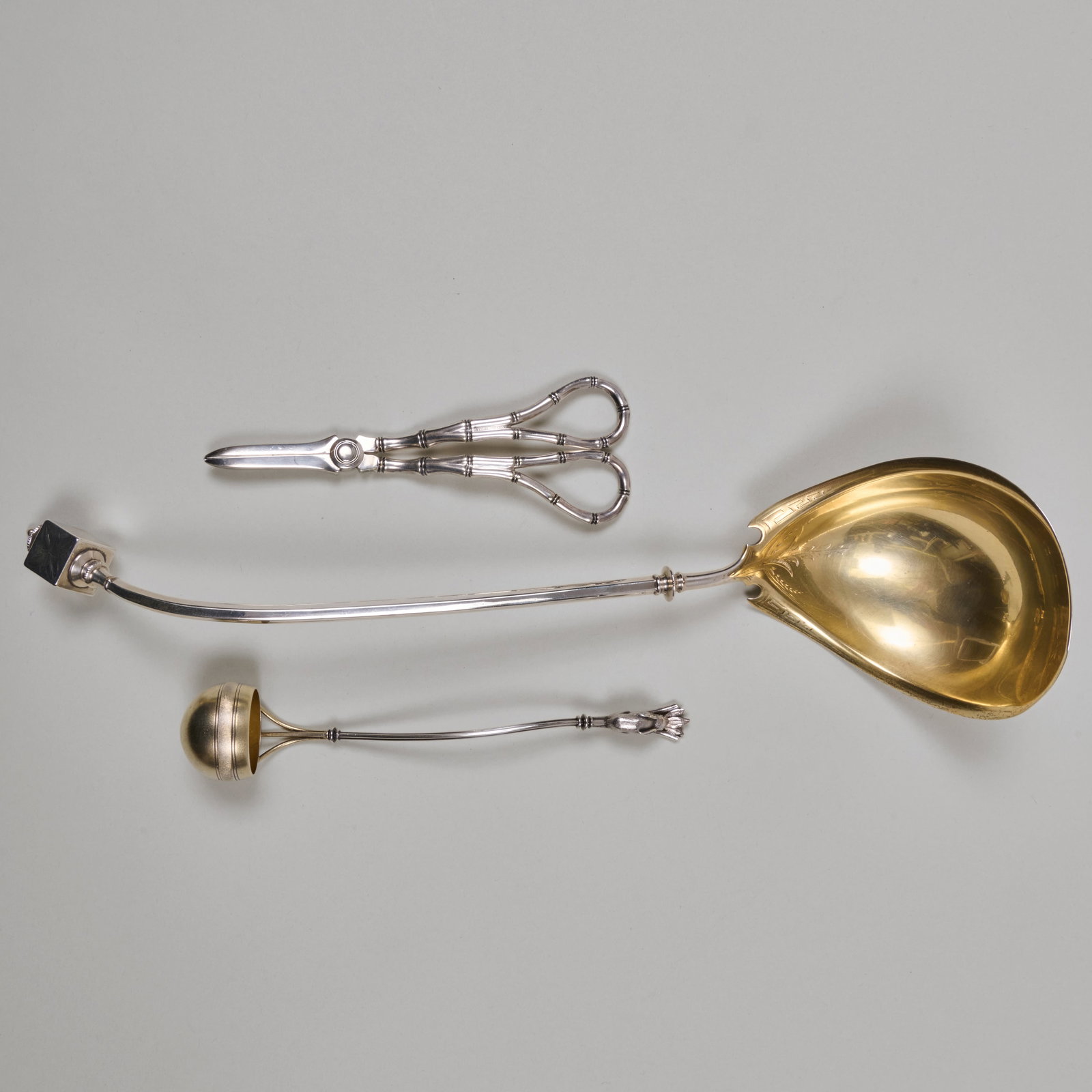 Two Silver Ladles and a Pair of Silver Plate Faux Bamboo Grape Shears: Two Silver Ladles and a Pair of Silver Plate Faux Bamboo Grape Shears The ladles marked 'Sterling'. The largest 15 1/2 in. long, 8.7 oz. approx. weighable. Ex-coll Sam Wagstaff and Anne Ehrenreich, by
