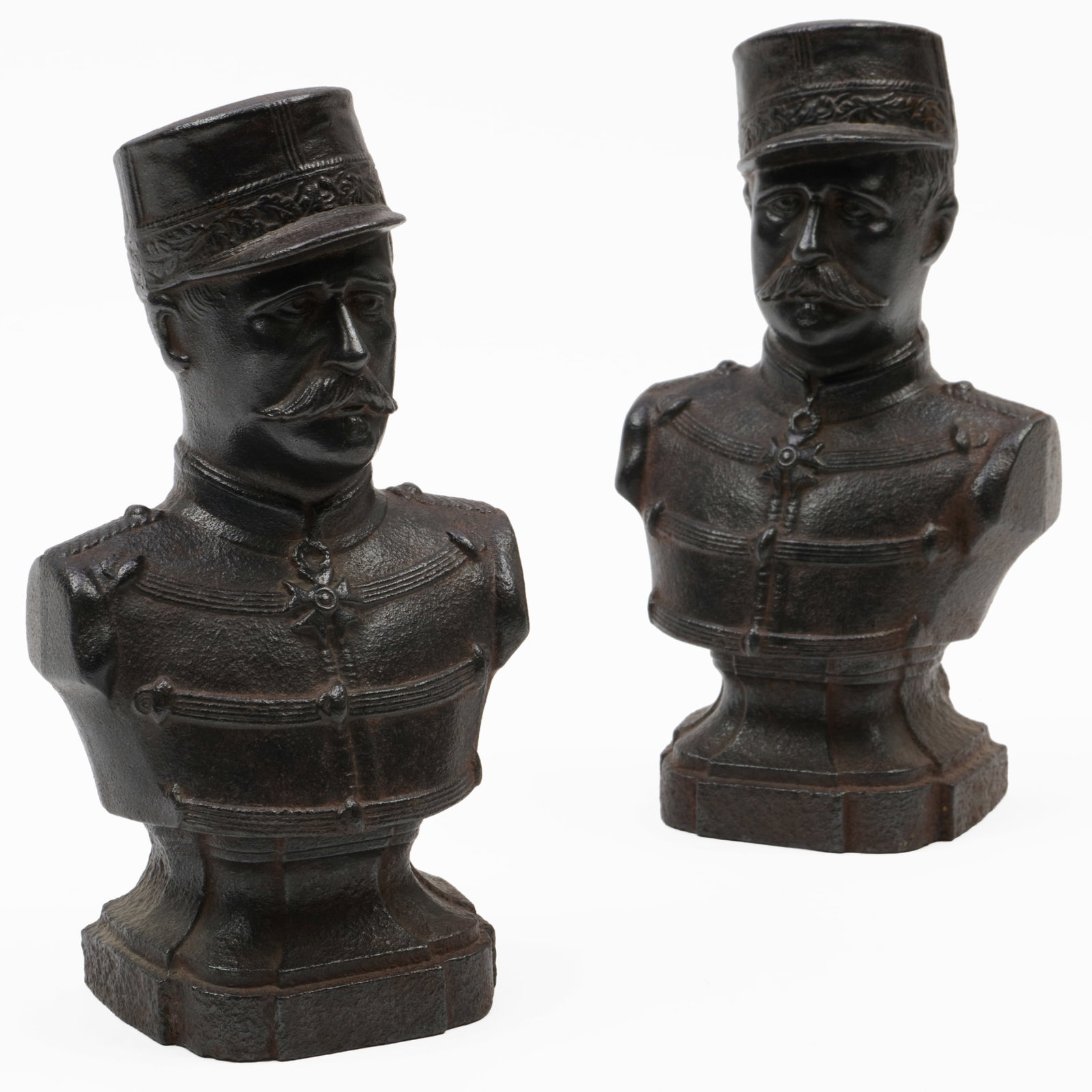 Two Cast Iron Busts of Soldiers: Two Cast Iron Busts of Soldiers Both stamped 14 on the reverse. 8 1/2 x 4 1/2 x 3 3/4 in. Collection of Irena and Mike Medavoy, Beverly Hills.