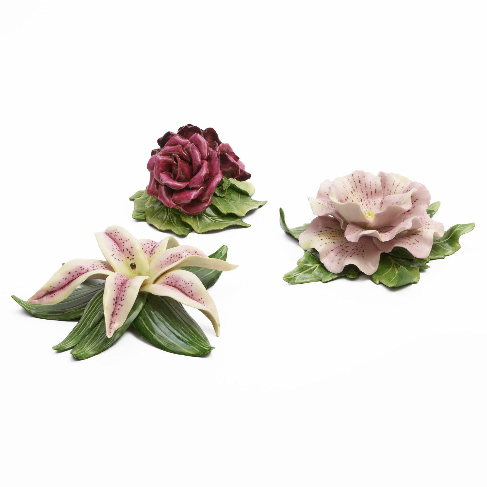 Three Katherine Houston Porcelain Models of Flowers: Three Katherine Houston Porcelain Models of Flowers Painted monogram mark. Comprising: A lily A camellia A cluster of roses The largest 2 1/2 x 8 1/2 x 9 in.