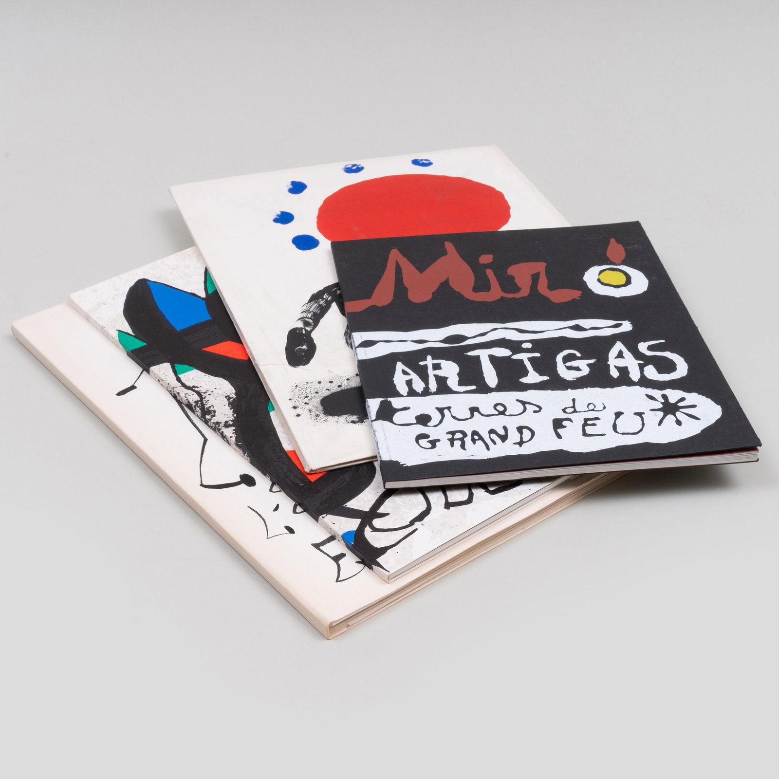 Group of Four Joan Miro Books: Group of Four Joan Miro Books Including: L'Oiseau Solaire, L'Oiseau Lunaire, Etincelles, copy 1116 of 1200; Miro Recent Paintings; Miro Sobreteixims; and Miro Artigas Terres de Grand Feu. Pierre