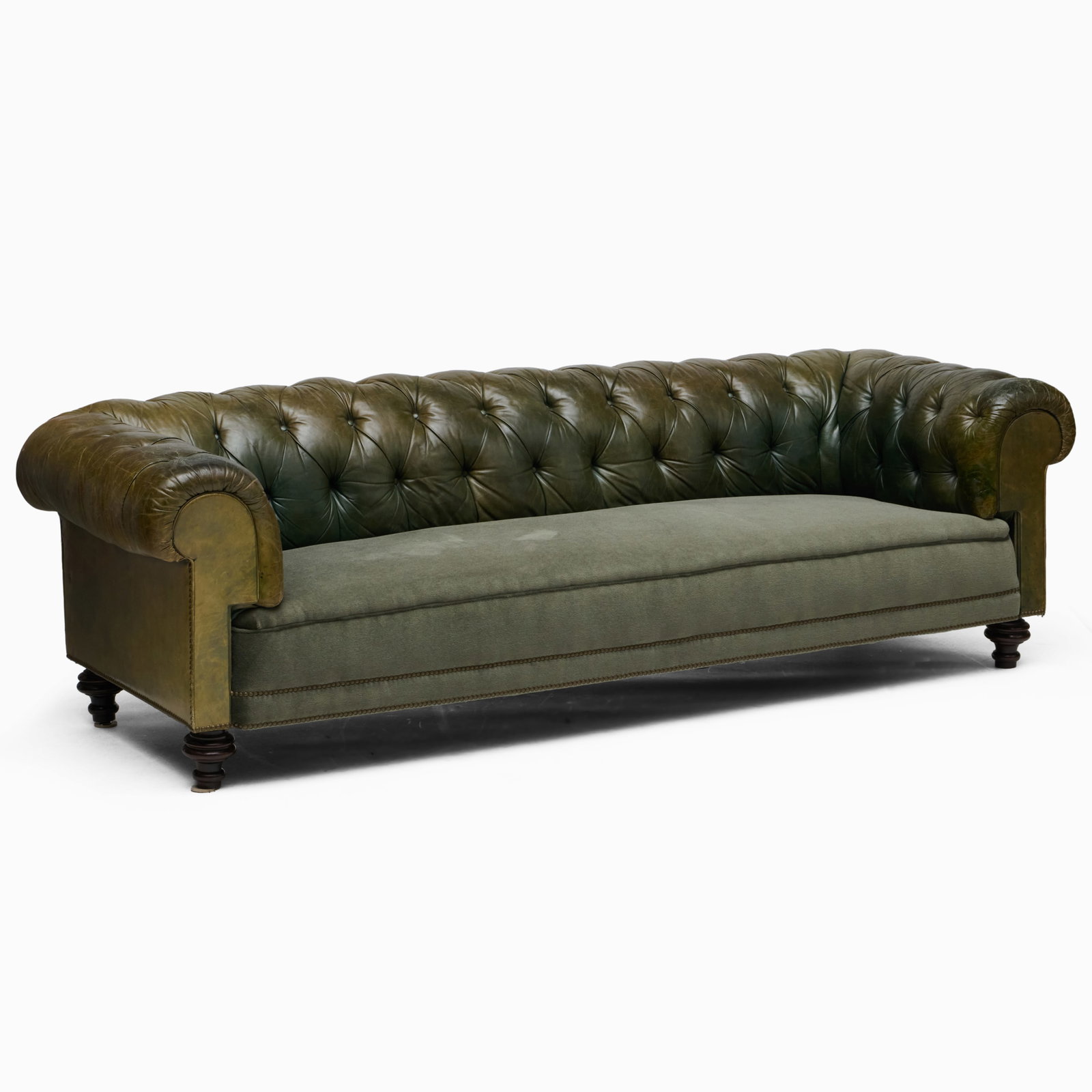Victorian Leather and Mohair Chesterfield Sofa with Four Pillows: Victorian Leather and Mohair Chesterfield Sofa with Four Pillows 29 x 7 ft. 2 x 40 in., seat height 16 in. Collection of Percival Paul Steinhart, III.
