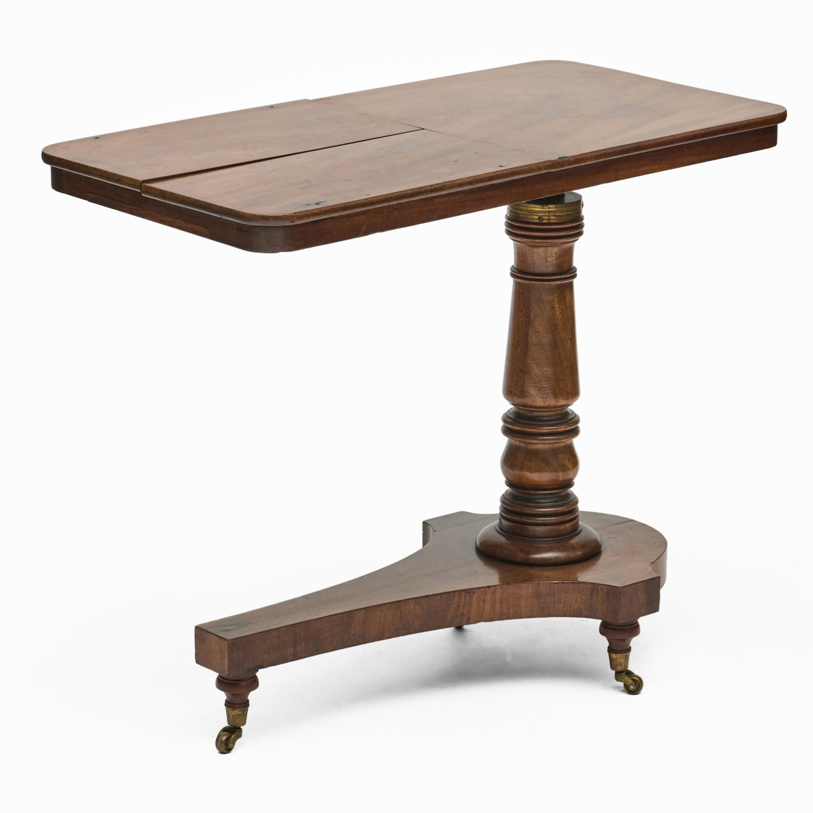 Regency Mahogany Retractable Reading Table: Raised on casters.28 1/2 x 34 x 18 in.