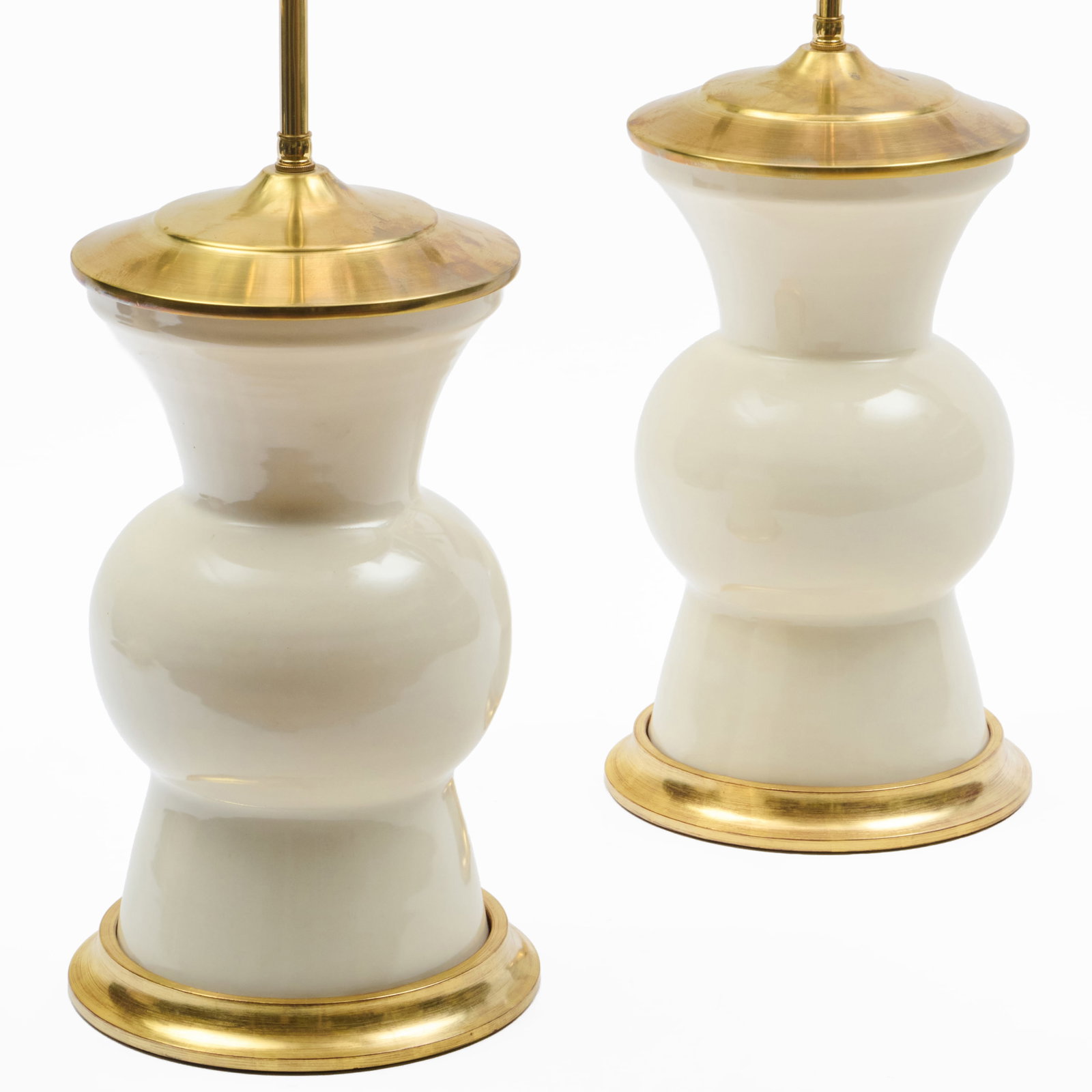 Pair of Christopher Spitzmiller White Glazed Porcelain Lamps: With label.18 1/2 x 7 1/2 in. diam. (to socket).