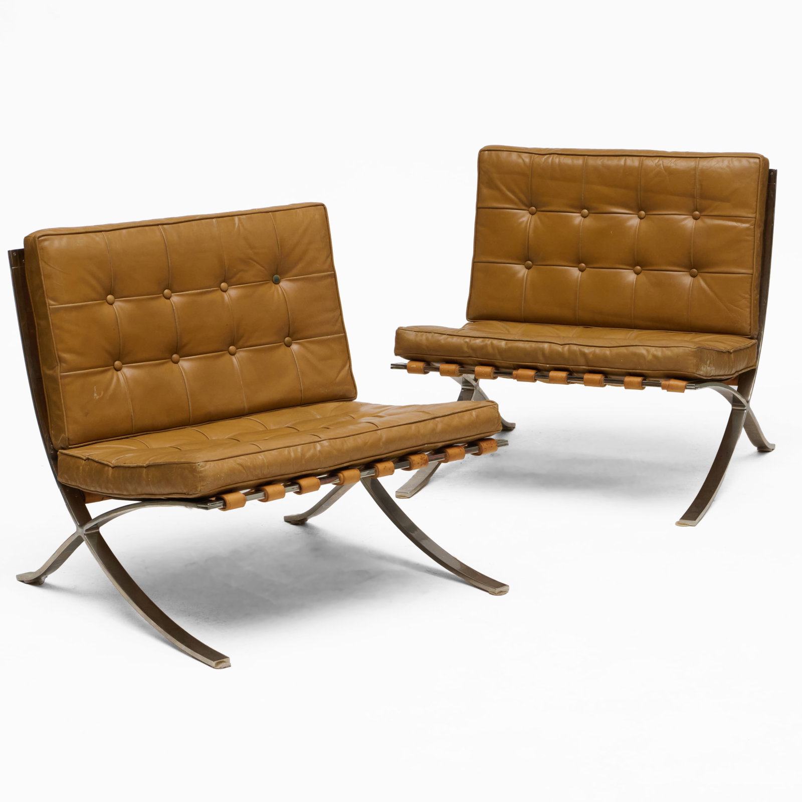 Pair of Mies van de Rohe Chrome and Upholstered Barcelona Chairs: 29 x 30 x 34 in, seat height 17 in.