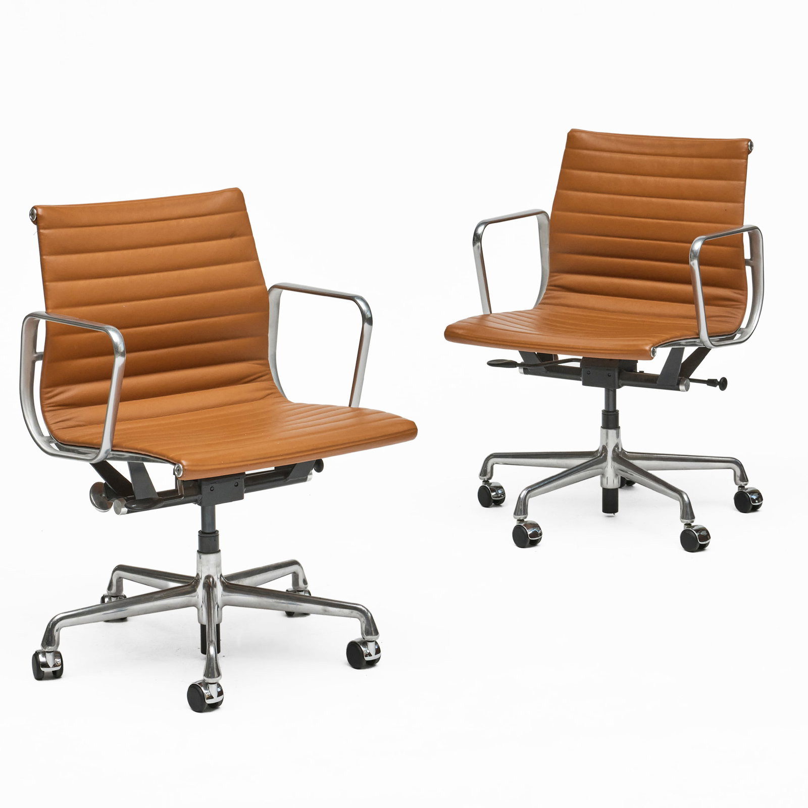Pair of Eames for Herman Miller 'Aluminum Group' Management Chairs: 34 1/2 x 23 x 20 1/ 2 in., seat height 19 in.