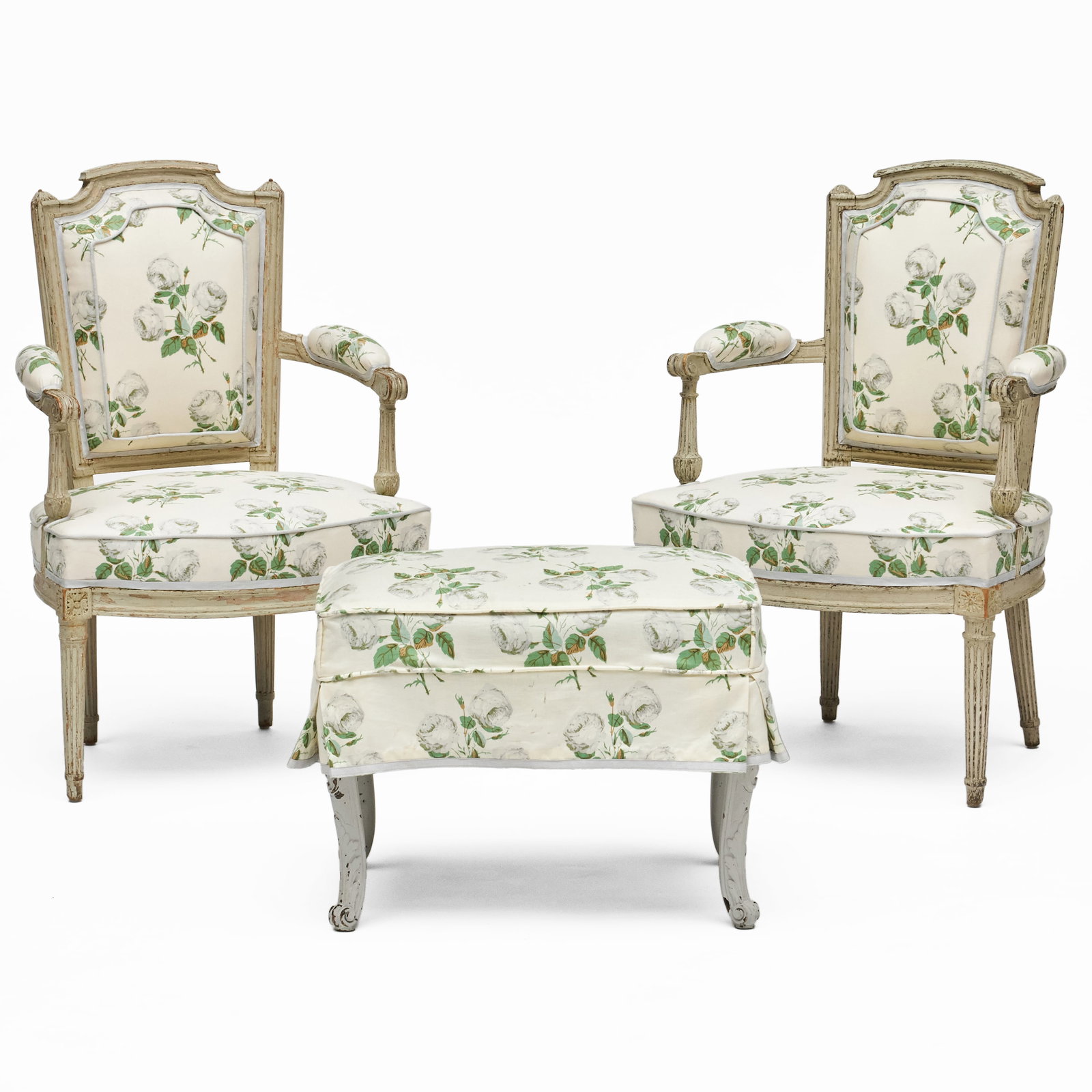 Pair of Louis XVI Grey Painted Fauteuils en Cabriolet with Associated Foot Stool, in Schumacher: The fauteuils 34 1/2 x 22 1/2 x 22 in., seat height 16 in.The stool 17 x 22 1/2 x 17 in.