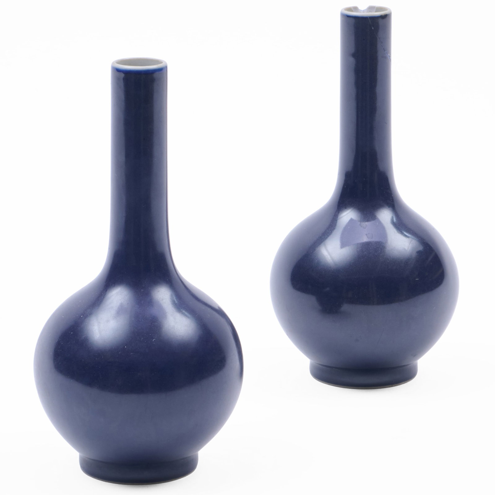 Pair of Chinese Blue Glazed Porcelain Bottle Vases: Blue double circle mark.7 x 3 1/4 in. diam.
