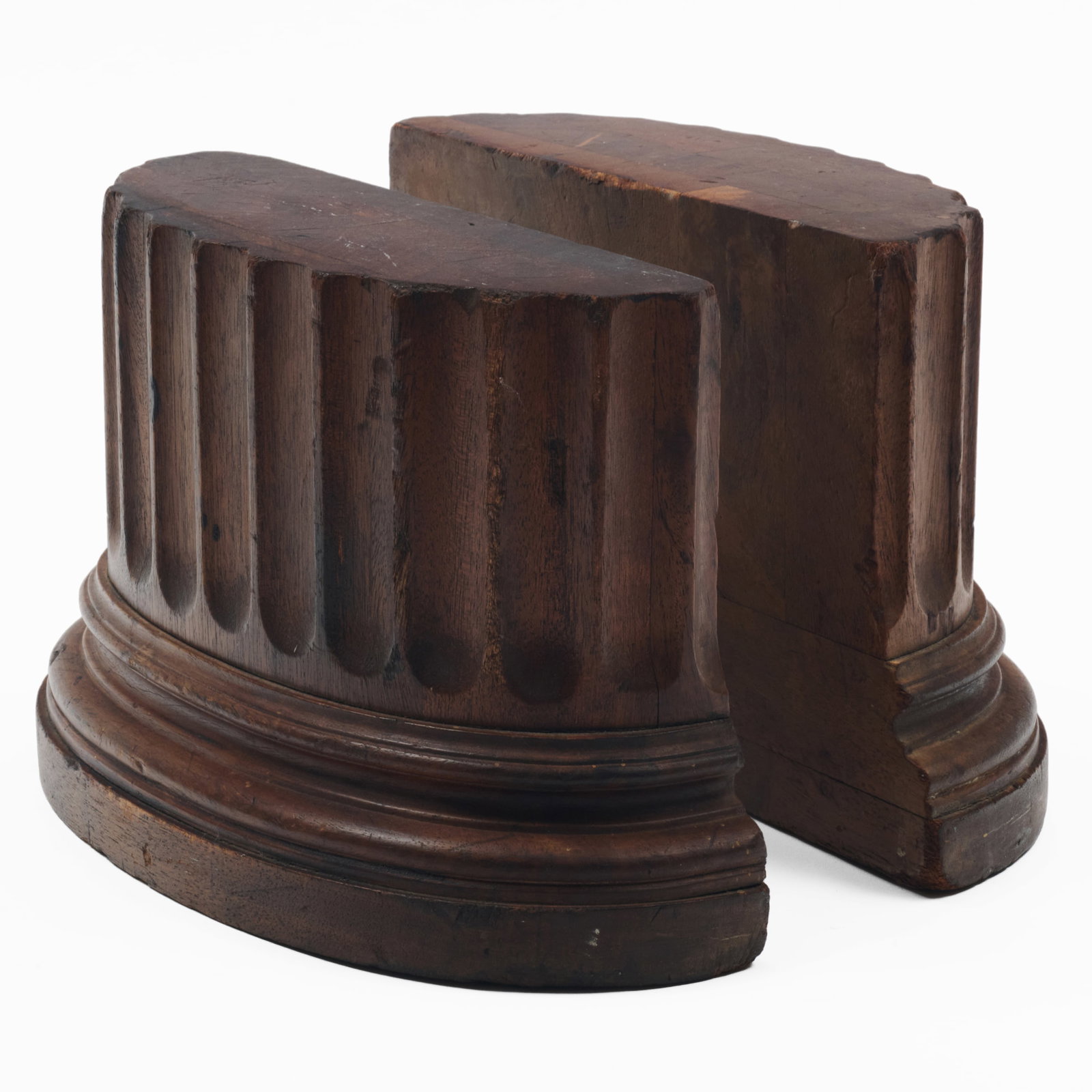 Pair of Short Demi-Lune Mahogany Fluted Capitals: 7 x 11 x 4 in.