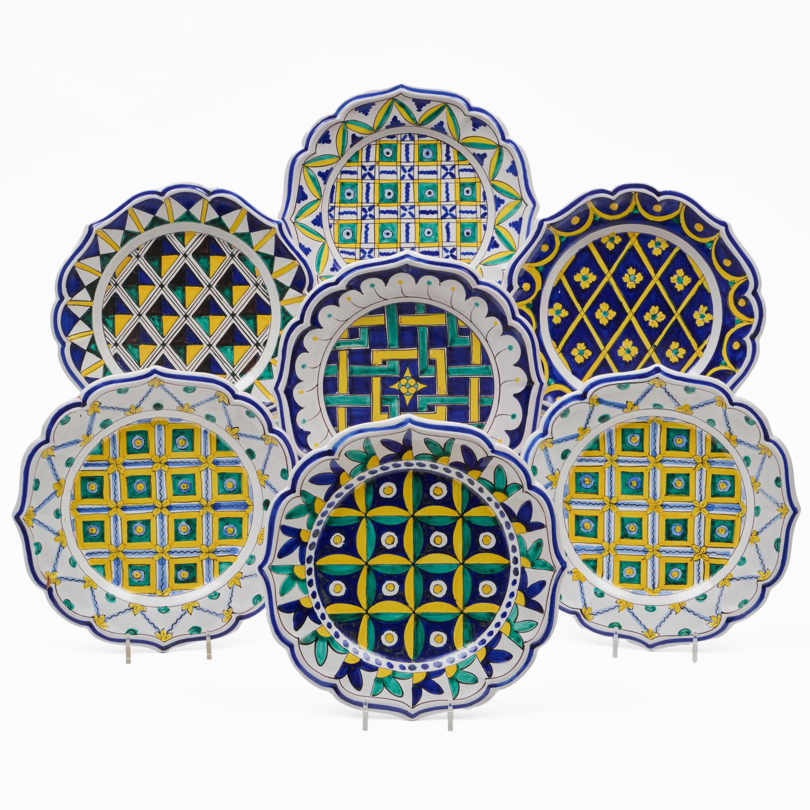 Set of Fourteen Italian Faience Plates: Black printed mark, in complementary patterns.9 1/2 in. diam.