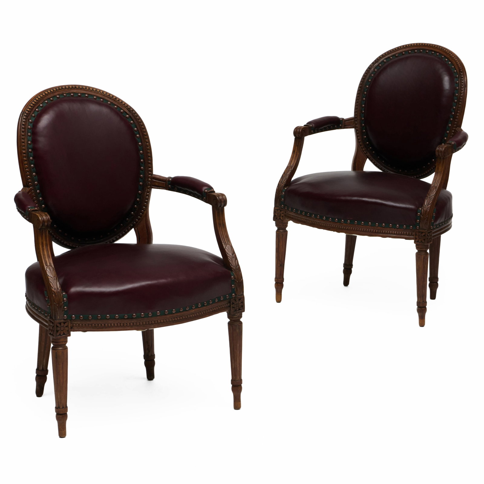 Pair of Louis XVI Style Beechwood Fauteuils en Cabriolet: Pair of Louis XVI Style Beechwood Fauteuils en Cabriolet Upholstered in leather.34 1/2 x 23 x 24 in., seat height 17 in. Collection of Percival Paul Steinhart, III.