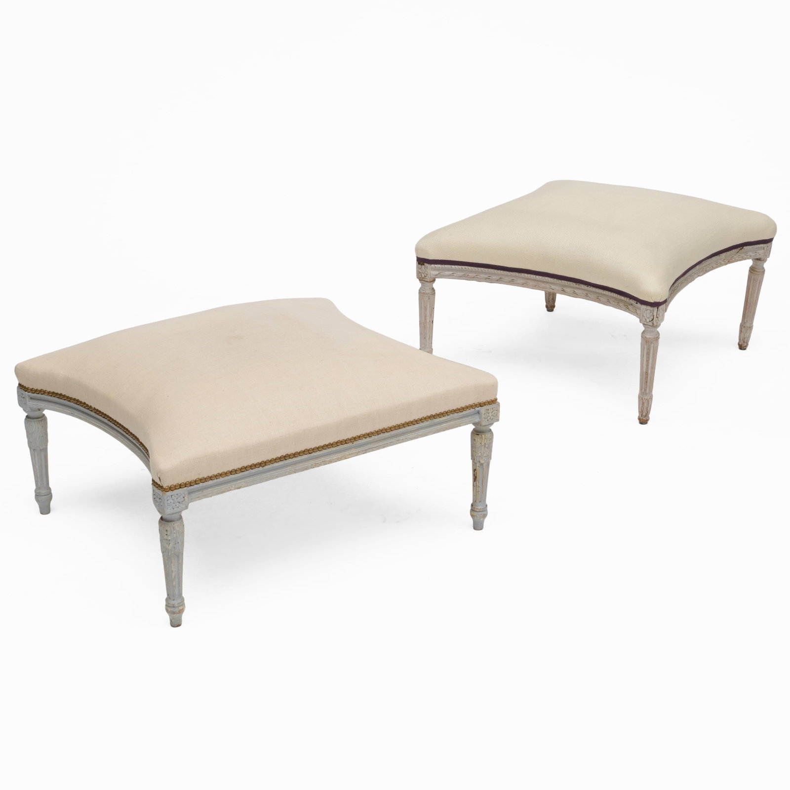 Two Similar Louis XVI Style Grey Painted Upholstered Ottomans: Two Similar Louis XVI Style Grey Painted Upholstered Ottomans 17 x 27 x 27 in. 16 x 30 x 25 1/2 in. Collection of Percival Paul Steinhart, III.