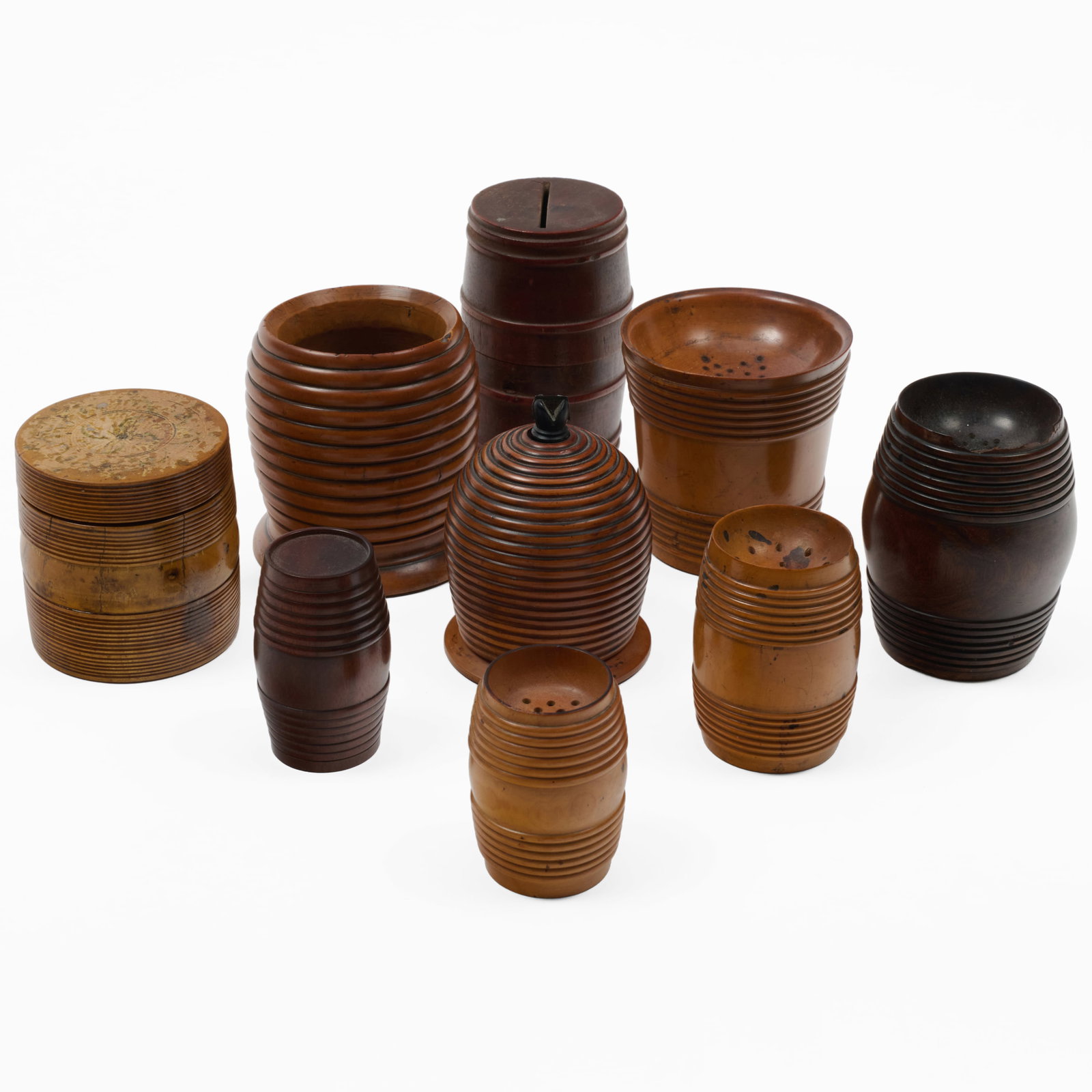 Group of Nine English Treen Table Articles: 3 3/4 x 2 1/4 in., diam., the tallest.2 1/4 x 1 3/4 in., diam. the smallest.