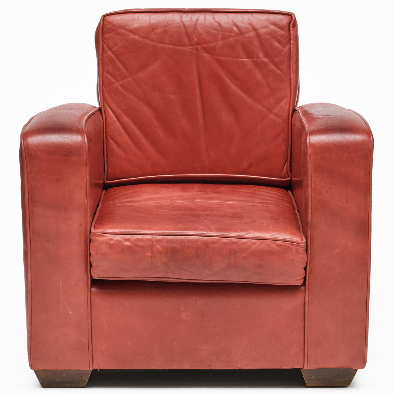Large Red Leather Armchair: Fitted with a blue striped slip cover. 36 x 35 x 37 3/4 in.