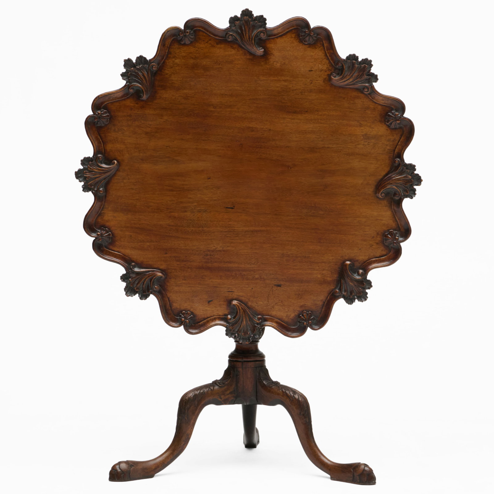 George III Style Carved Mahogany Pie Crust Tea Table: With a bird cage base.28 1/4 x 34 3/4 x 33 1/2 in. diam.