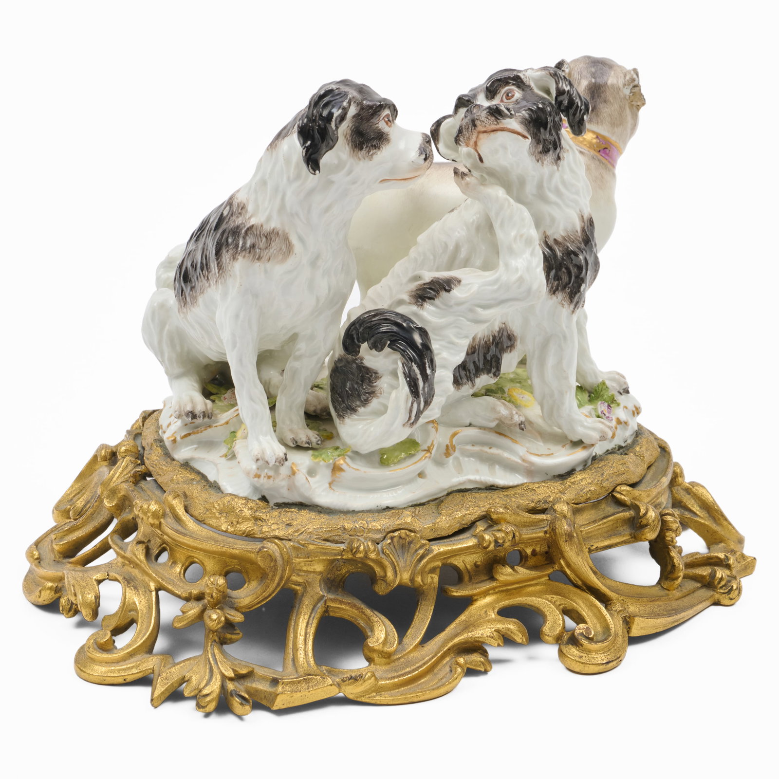 Ormolu Mounted Meissen Porcelain Group of Three Dogs, After a Model by Joachim Kaendler: Ormolu Mounted Meissen Porcelain Group of Three Dogs, After a Model by Joachim Kaendler Model 2104.The figure group 5 3/4 x 8 x 5 3/4 in., 8 x 10 3/4 x 8 1/2 in. (overall).