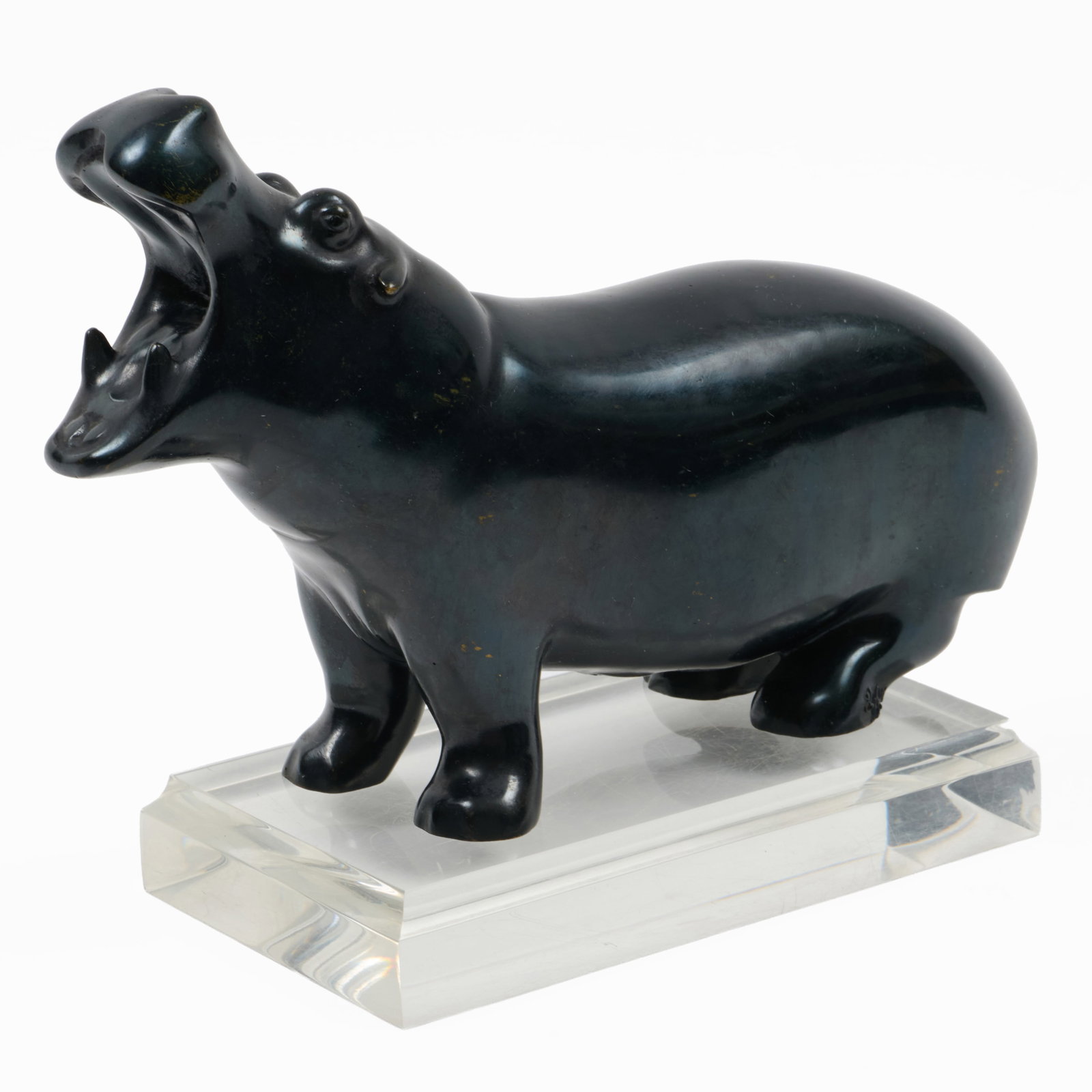 Francois Pompon (1855-1933): Le Hippopotame: Francois Pompon (1855-1933): Le Hippopotame Bronze with patine noir, signed 'Pom Pon' and numbered 2/19 , with the Valsuani foundry mark on the underside. 5 3/4 x 9 x 3 in.
