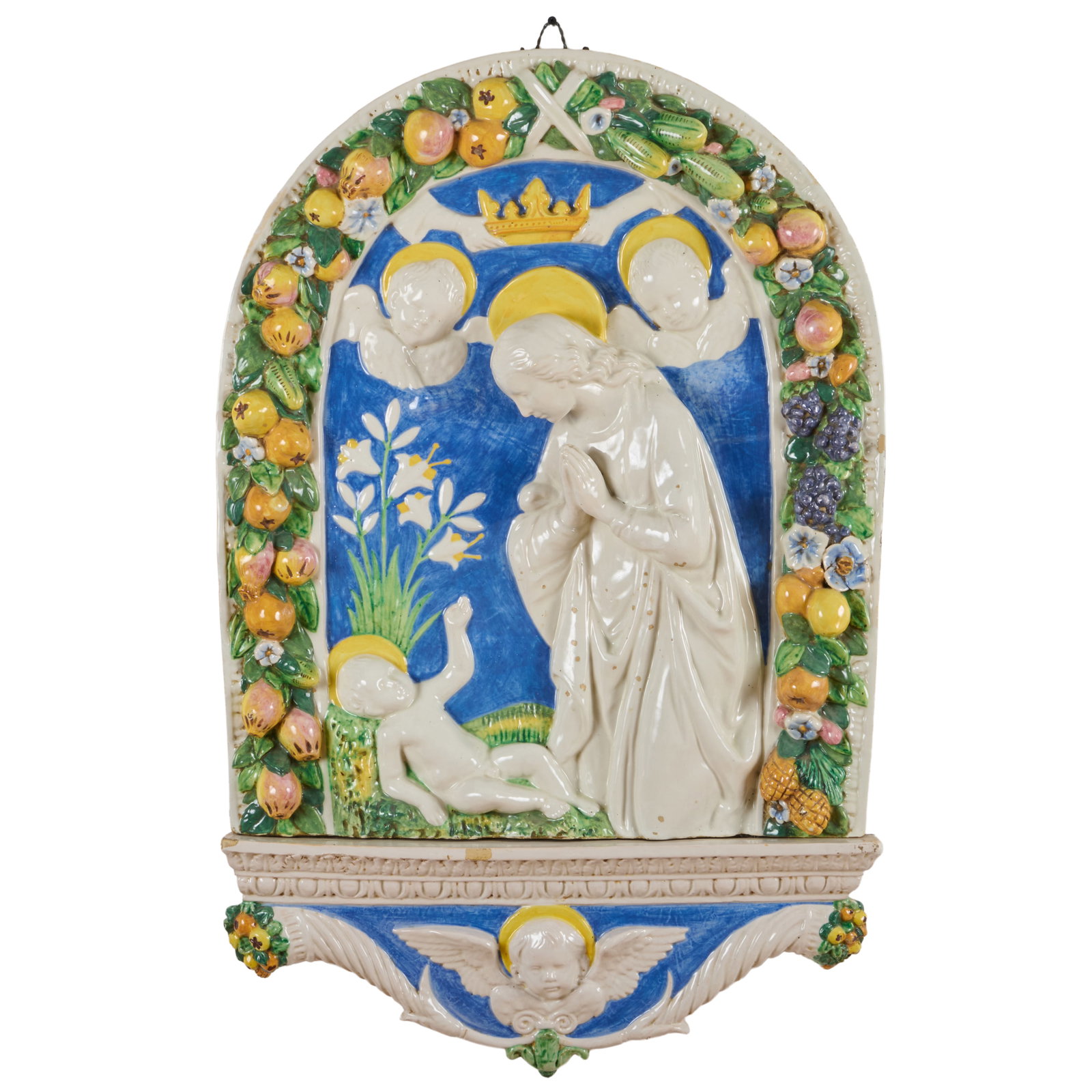 After Della Robbia Glazed Plaque of Madonna and Child with Cherubim: After Della Robbia Glazed Plaque of Madonna and Child with Cherubim Black painted mark 'Italy'.2 1/2 x 39 x 24 1/4 in.