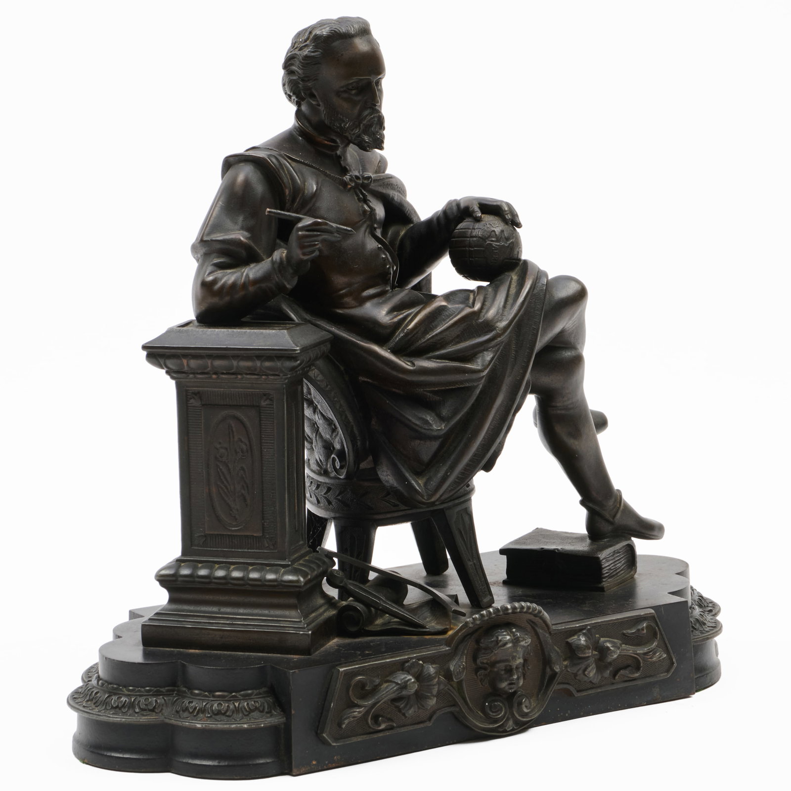 Patinated Bronze Figure of a Cartographer: Patinated Bronze Figure of a Cartographer Raised on a cast iron base.11 x 11 x 5 1/2 in. Property from a New York Private Collector