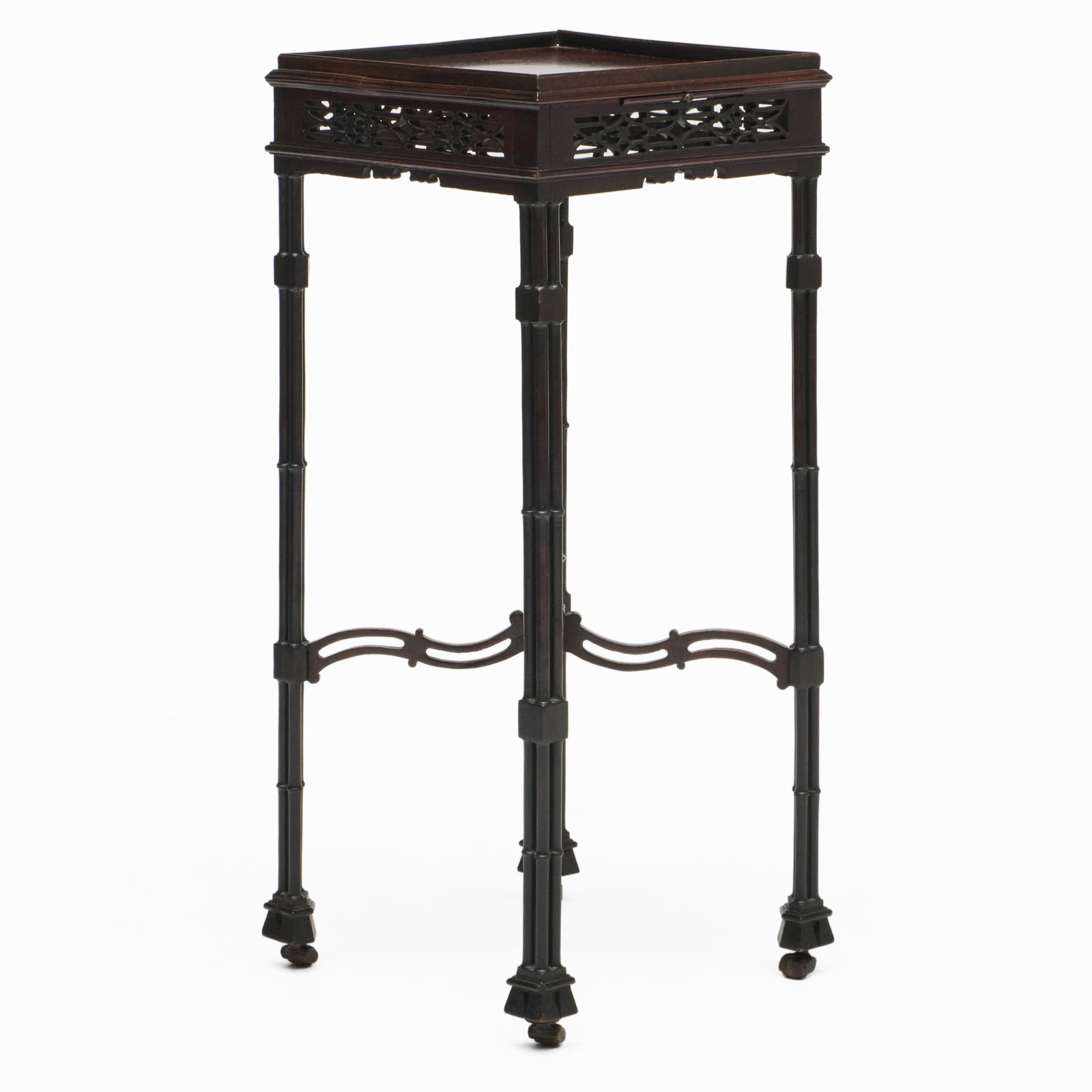 Fine George III Mahogany Kettle Stand: Fine George III Mahogany Kettle Stand Fitted with a candle slide and raised on wooden casters. 27 3/4 x 11 3/4 x 11 3/4 in.