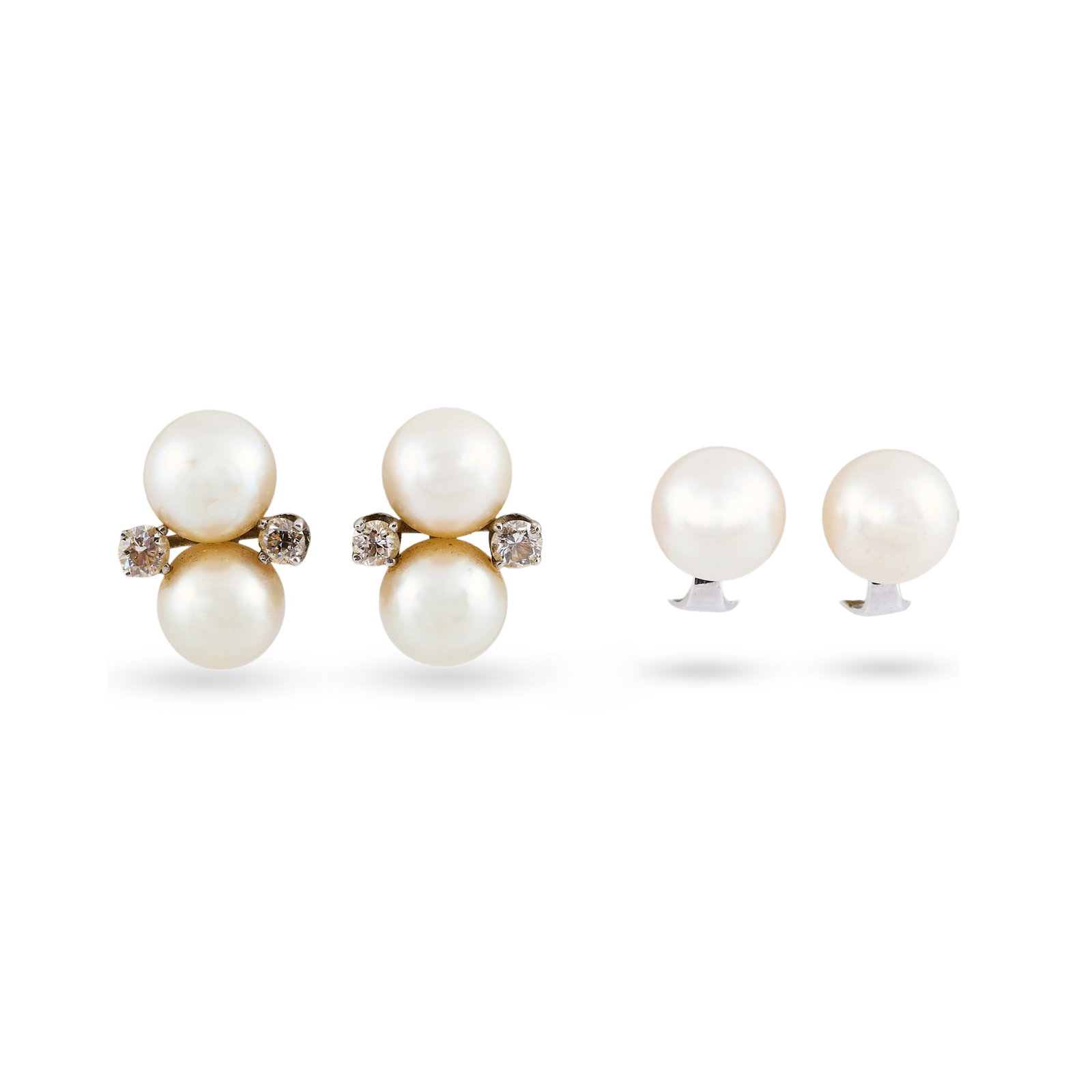 Two Pairs of Pearl Earclips: Two Pairs of Pearl Earclips One pair set with diamonds.Approx. 3/4 x 1/2 in. Property of a Lady, Upper East Side, NYC.