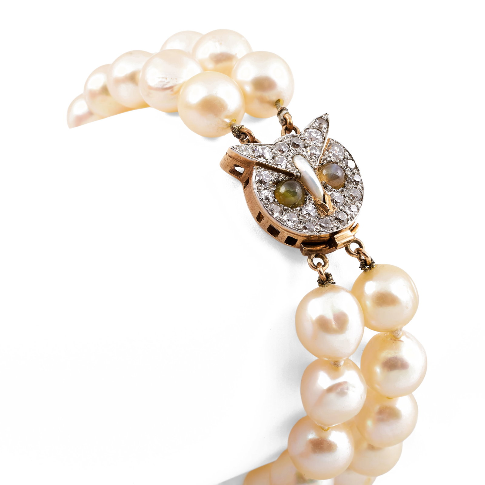 Double Strand Pearl Bracelet: Double Strand Pearl Bracelet With diamond, agate and mother-of-pearl owl-shaped clasp.7 in. Property of a Lady, Upper East Side, NYC.