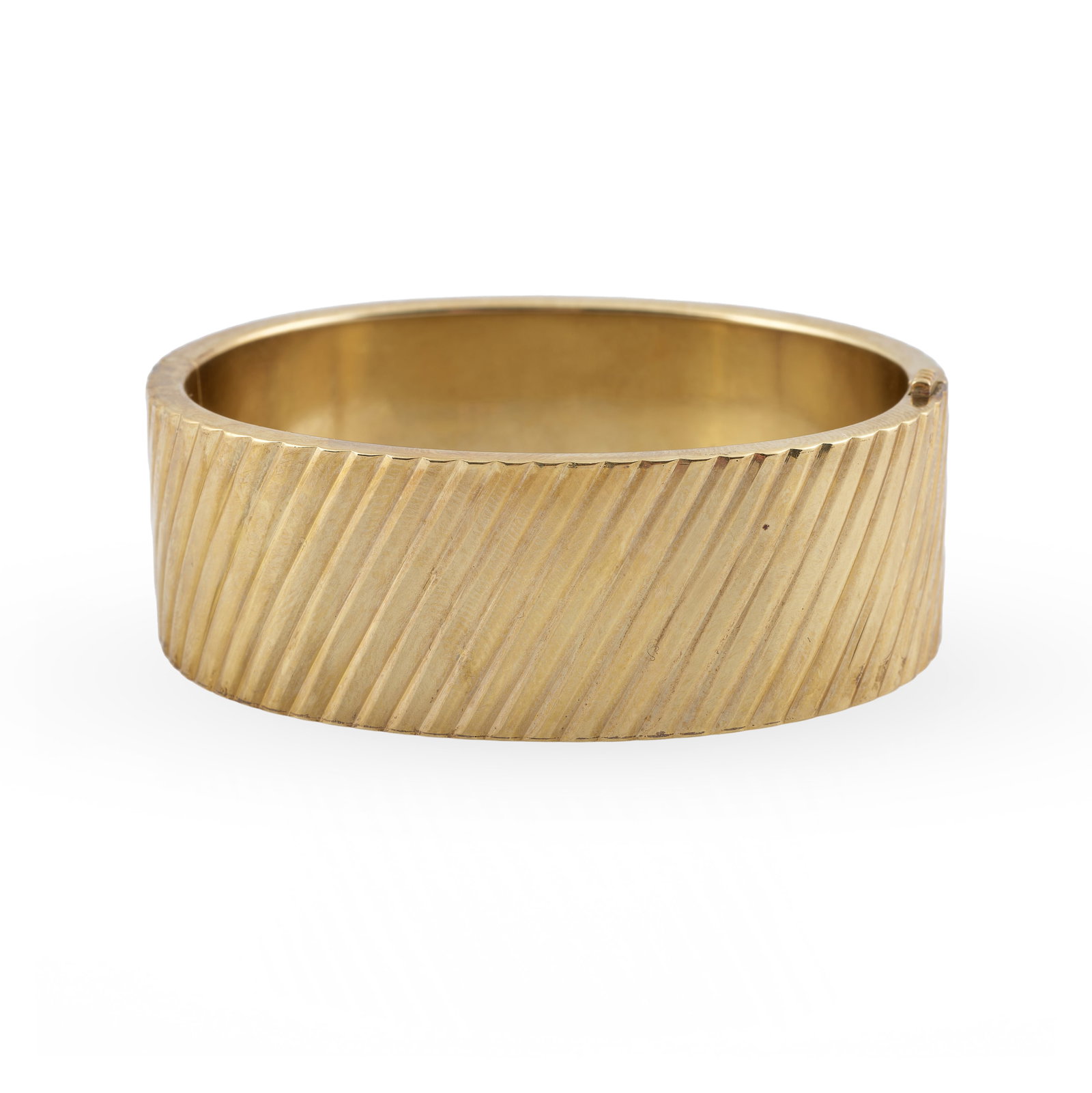 14k Textured Gold Hinged, Wide Bangle Bracelet: 14k Textured Gold Hinged, Wide Bangle Bracelet Marked '585'.7/8 in. wide, 6 3/4 in. (interior dims), 40.1 dwts.