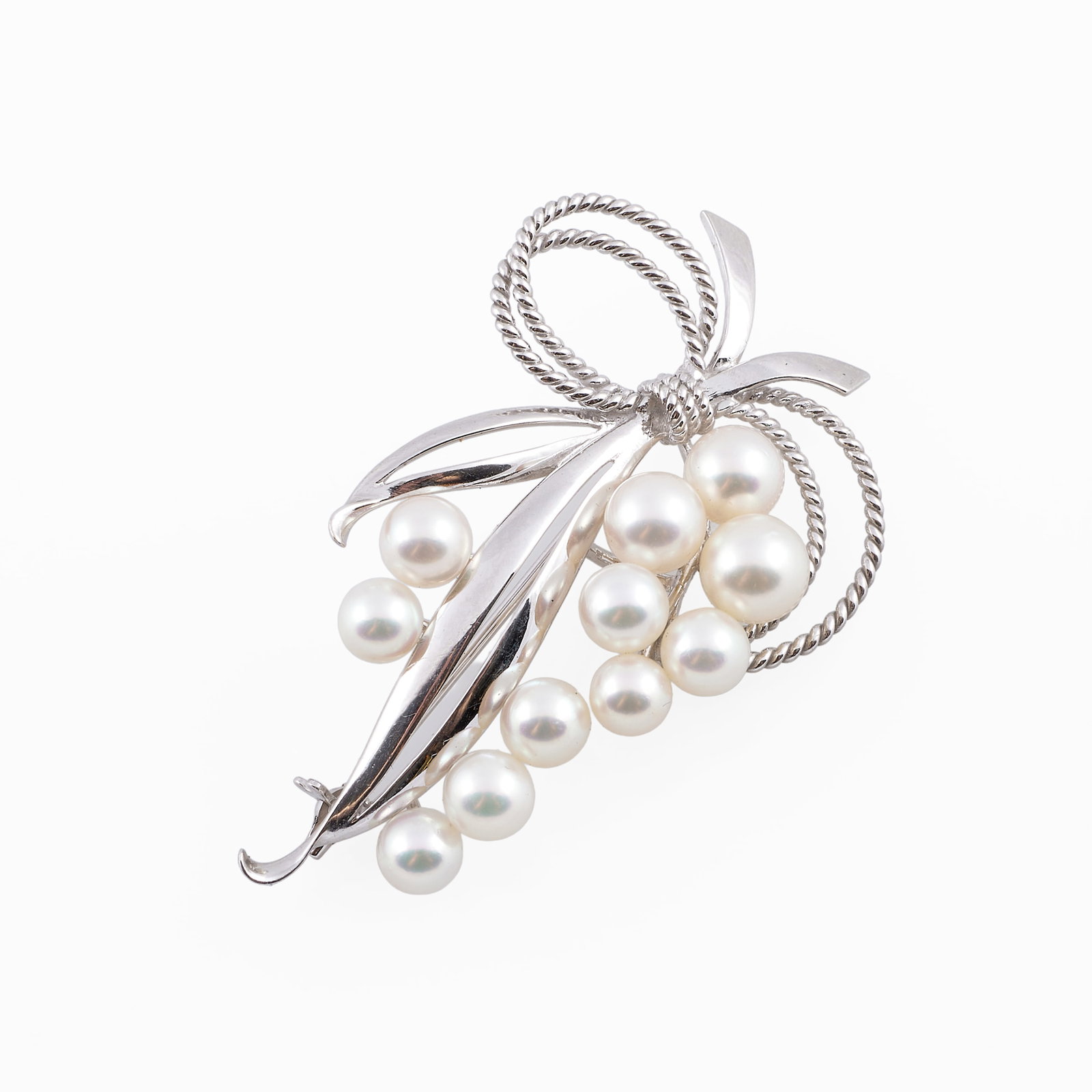 14k White Gold and Pearl Bow Brooch: 14k White Gold and Pearl Bow Brooch Marked 'WG / K14'.2 1/4 x 1 1/2 in., 7.5 dwts.