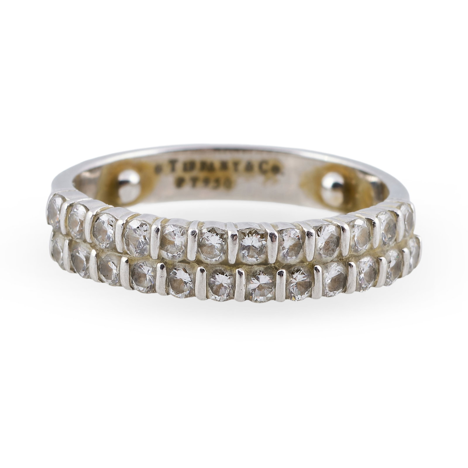 Tiffany & Co. Platinum & Diamond Wedding Band: Tiffany & Co. Platinum & Diamond Wedding Band Marked 'Tiffany & Co. / PT950'Size 7 1/2, 4.3 dwts.