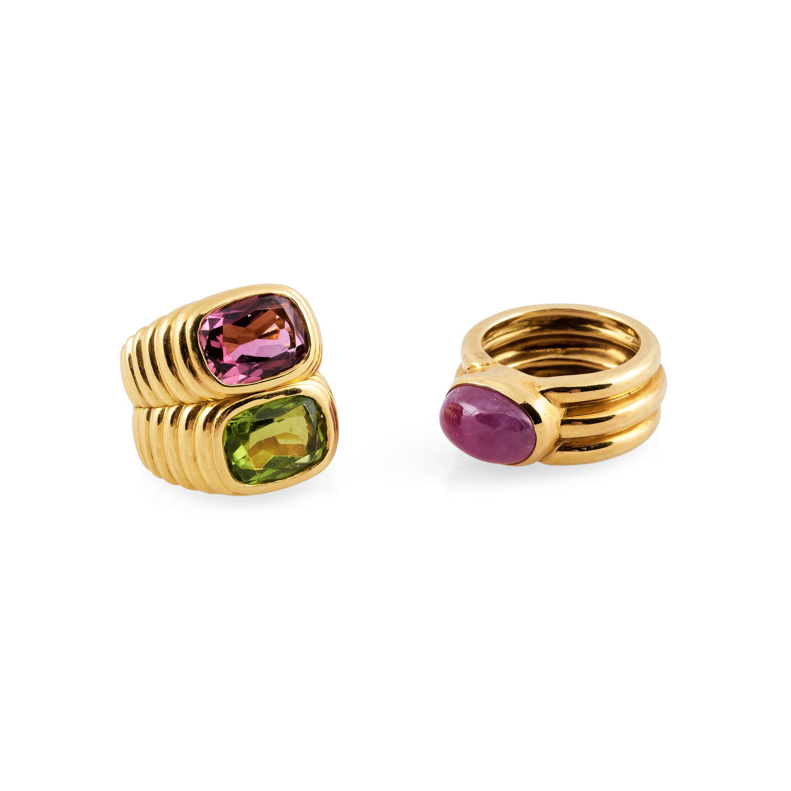 Bulgari 18k Gold Gem Set Ring and an Andrew Clunn 18k Gold and Cabochon Ruby Ring: Bulgari 18k Gold Gem Set Ring and an Andrew Clunn 18k Gold and Cabochon Ruby Ring The first marked 'Bulgari / BD1544 / 750', size 3 1/2-4, 14.1 dwts.; the second marked 'A. Clunn / 18k', size 4, 7