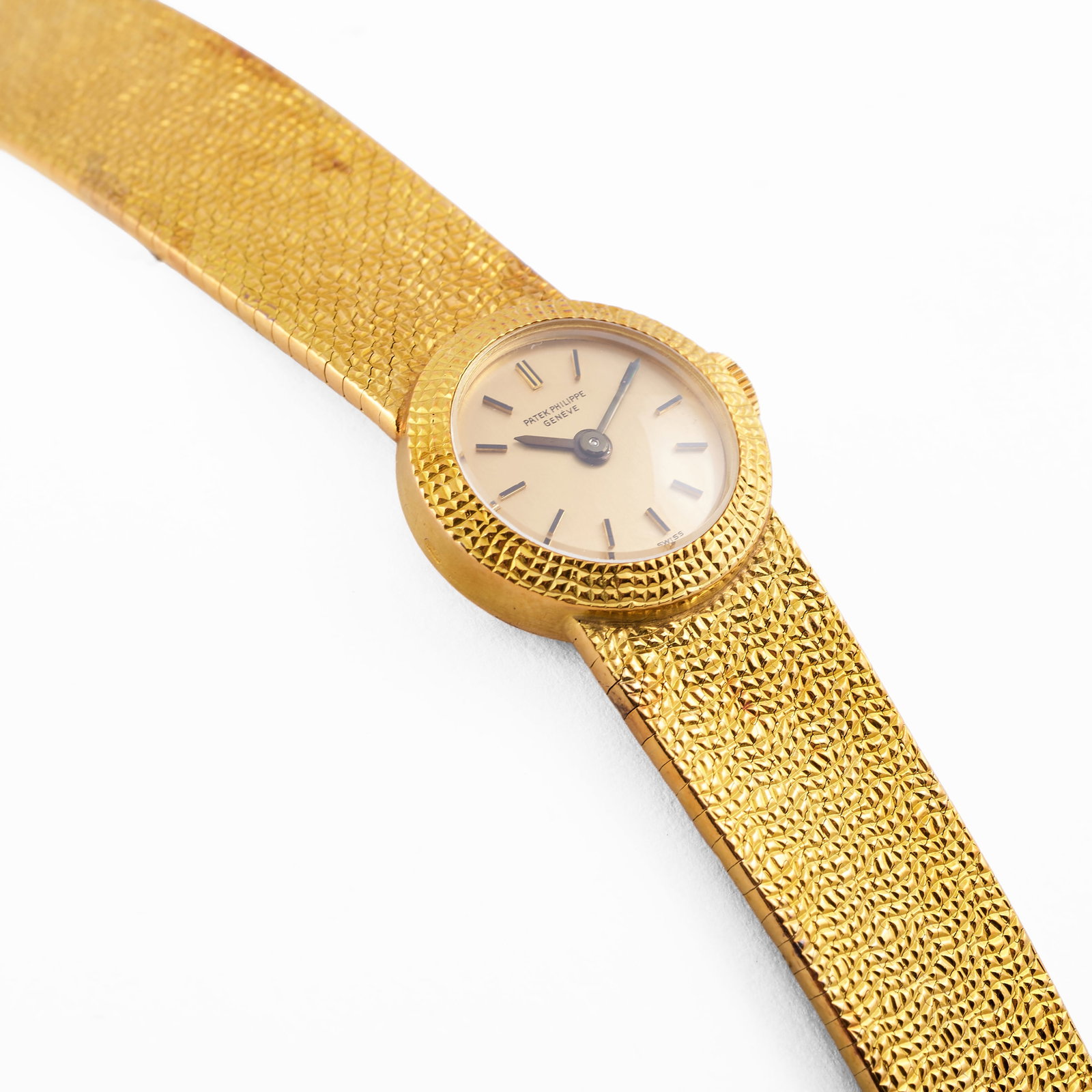 Patek Philippe 18k Gold Lady's Bracelet Watch: Patek Philippe 18k Gold Lady's Bracelet Watch Marled 'Patek-Philippe / Geneve / 750'.6 1/4 in., 28.2 dwts. Collection of Suzanne Valenstein.