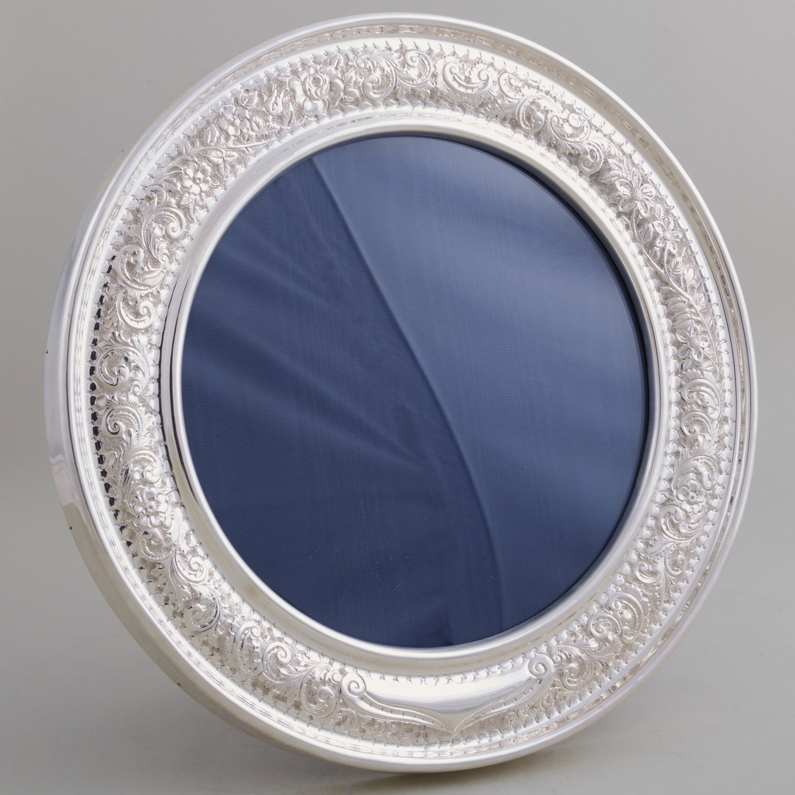 Large Victorian Silver Circular Frame: Large Victorian Silver Circular Frame Mark of Sibray, Hall & Co. Ltd,. London, 1900.14 1/2 in. diam. Property from the Jordan Saunders Collection