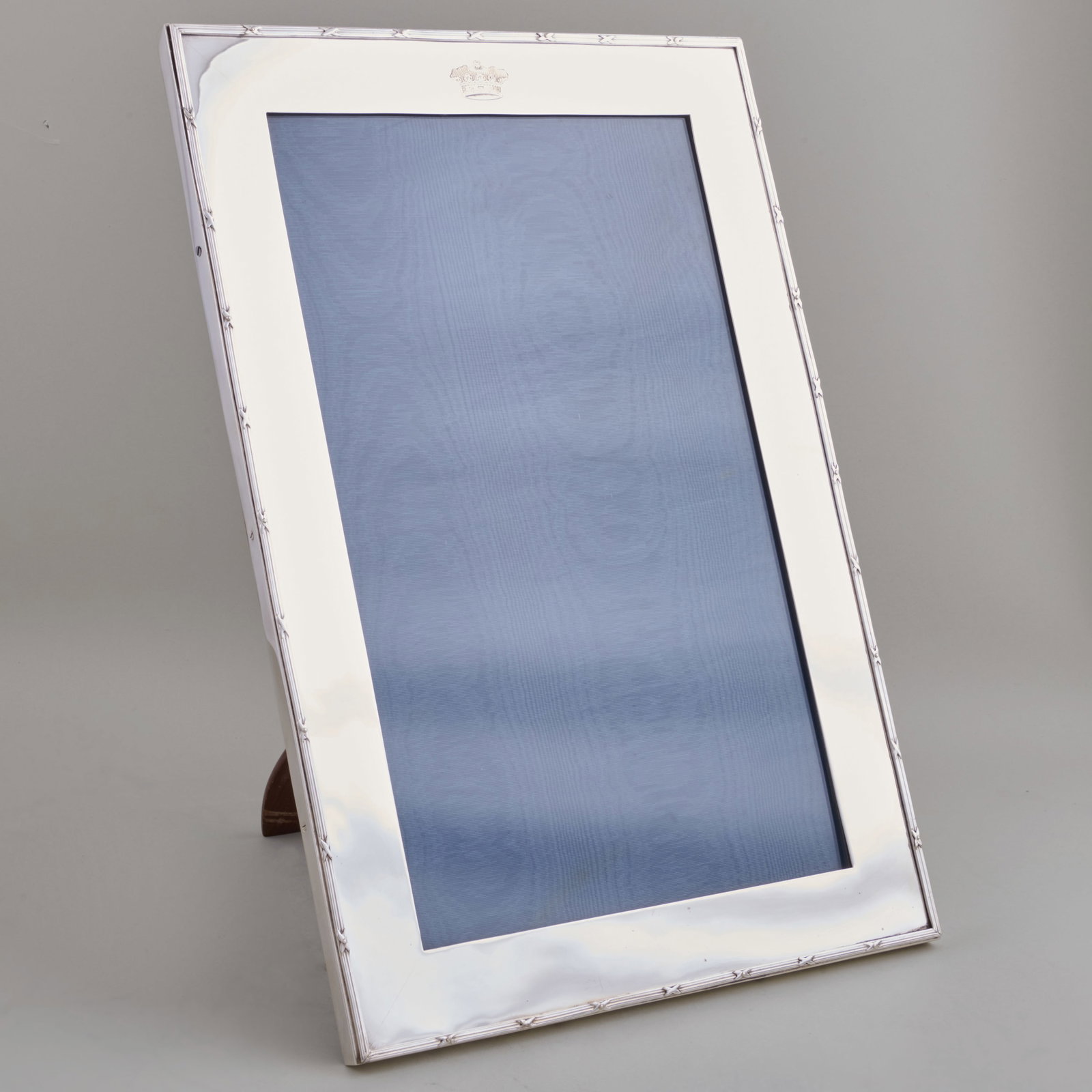 Large Victorian Silver Frame: Large Victorian Silver Frame Mark of Josiah Williams & Co., London, 1895, engraved with crown.16 1/2 x 11 1/4 in. Property from the Jordan Saunders Collection