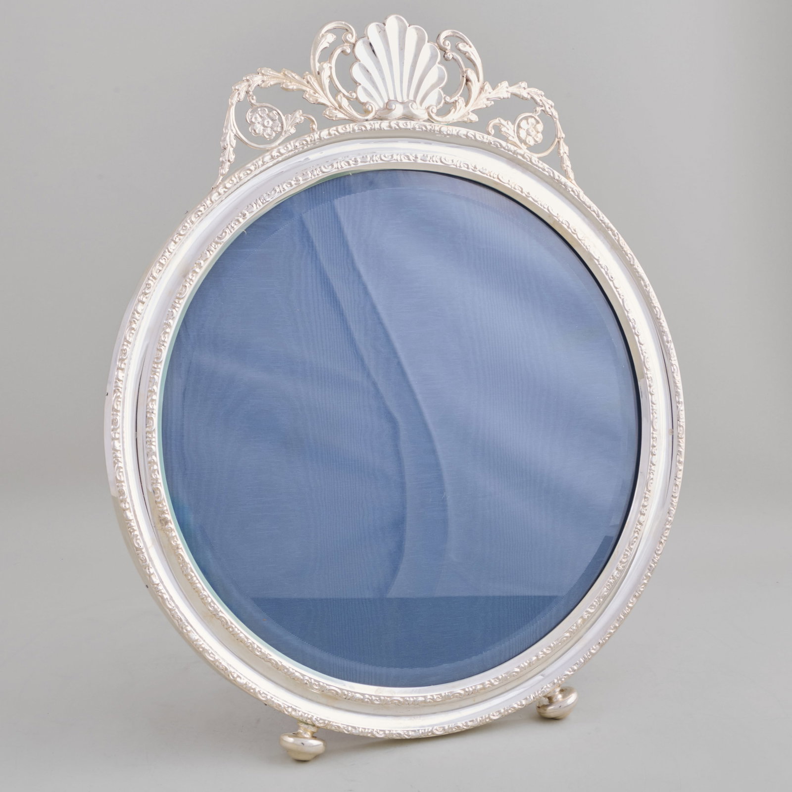 Large George V Silver Circular Frame: Large George V Silver Circular Frame Mark fo Henry Matthews, Birmingham, 1913.16 1/2 x 13 1/2 in. Property from the Jordan Saunders Collection